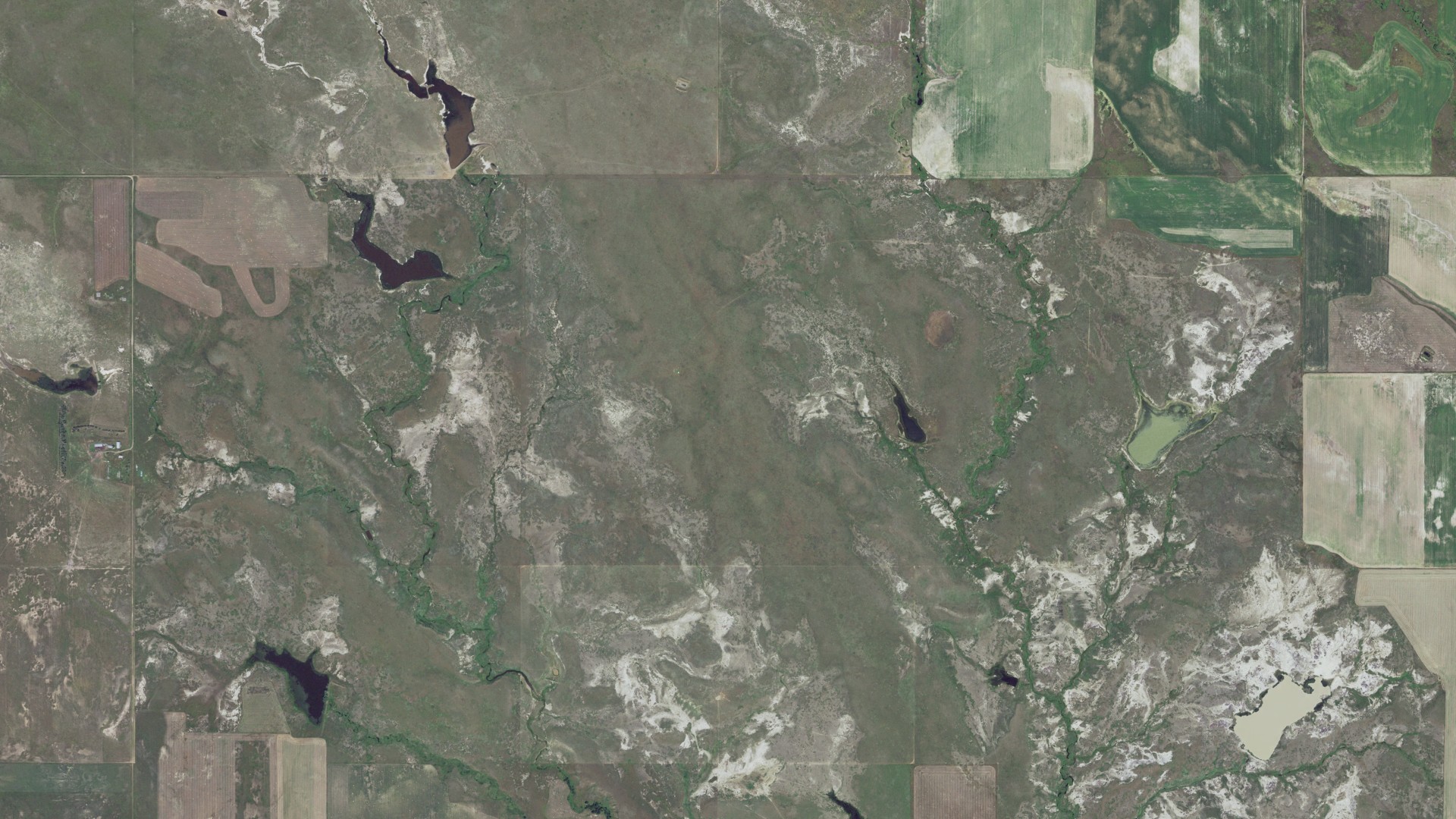 Natural-color aerial photograph of land around Rolling Green, South Dakota
