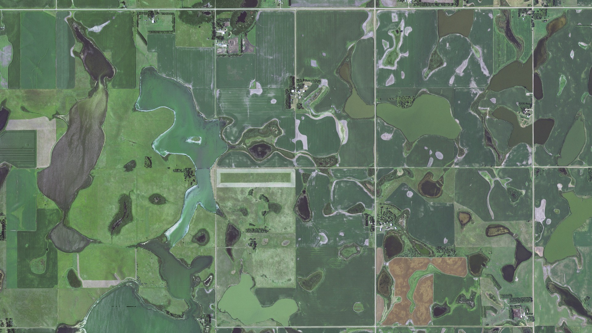 Natural-color aerial photograph of land around Webster, South Dakota