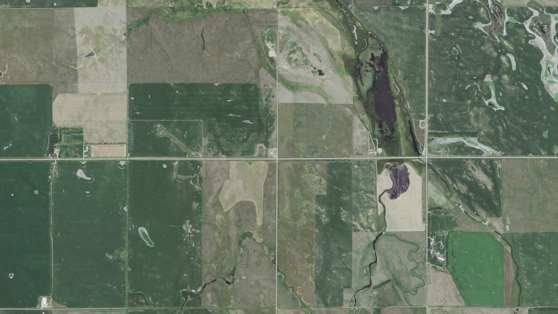 Natural-color aerial photograph of land around Carlton, South Dakota