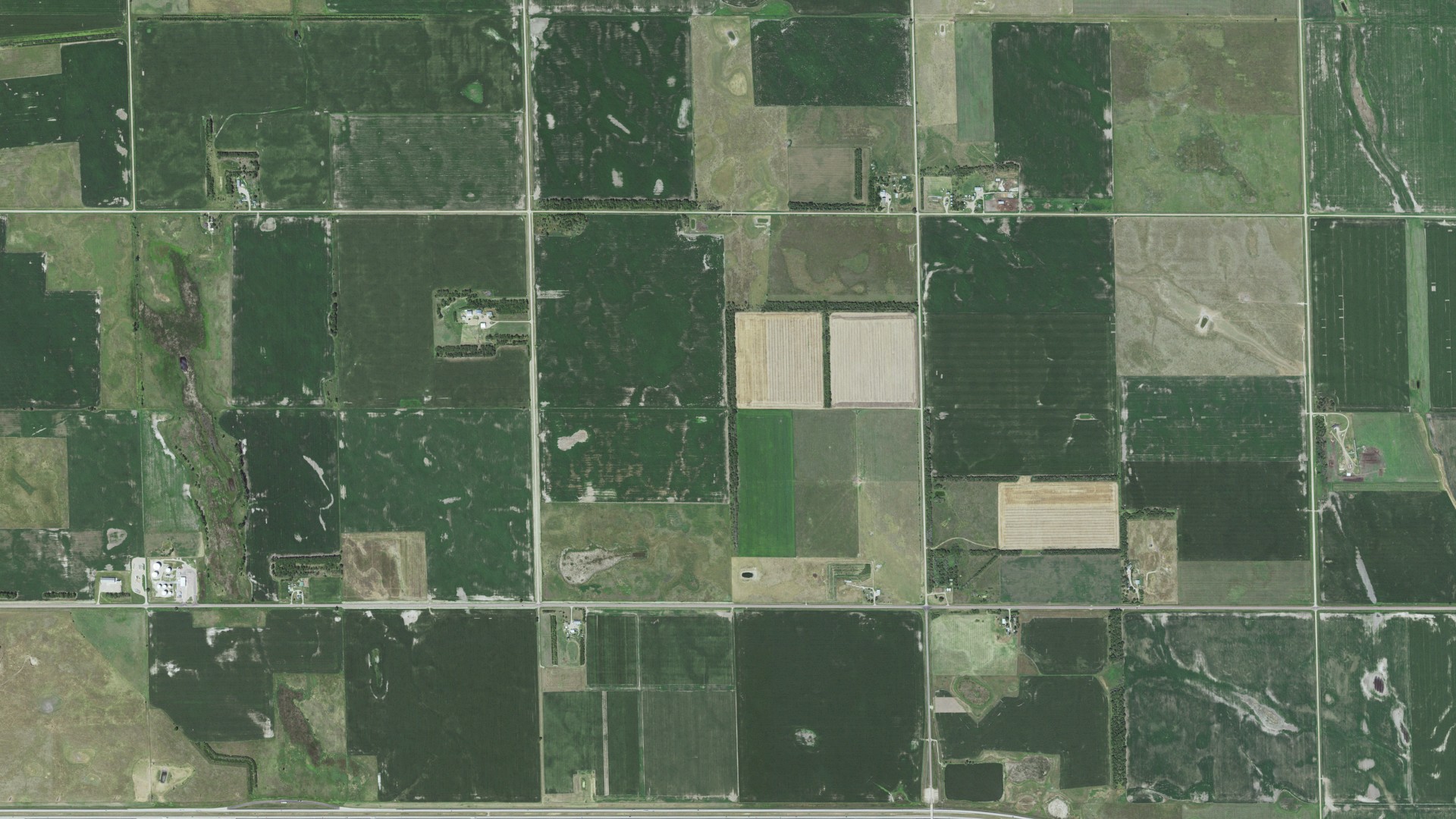 Natural-color aerial photograph of land around Hanson, South Dakota