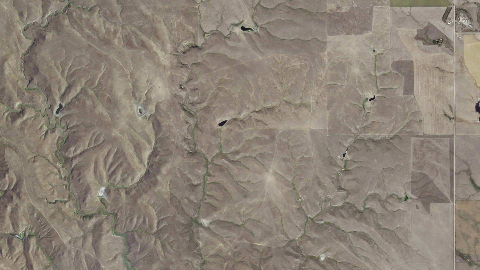 Natural-color aerial photograph of land around Okaton, South Dakota