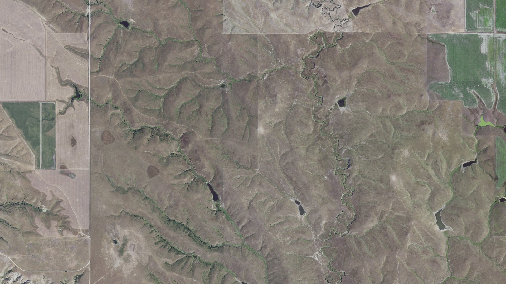 Natural-color aerial photograph of land around Zickrick, South Dakota