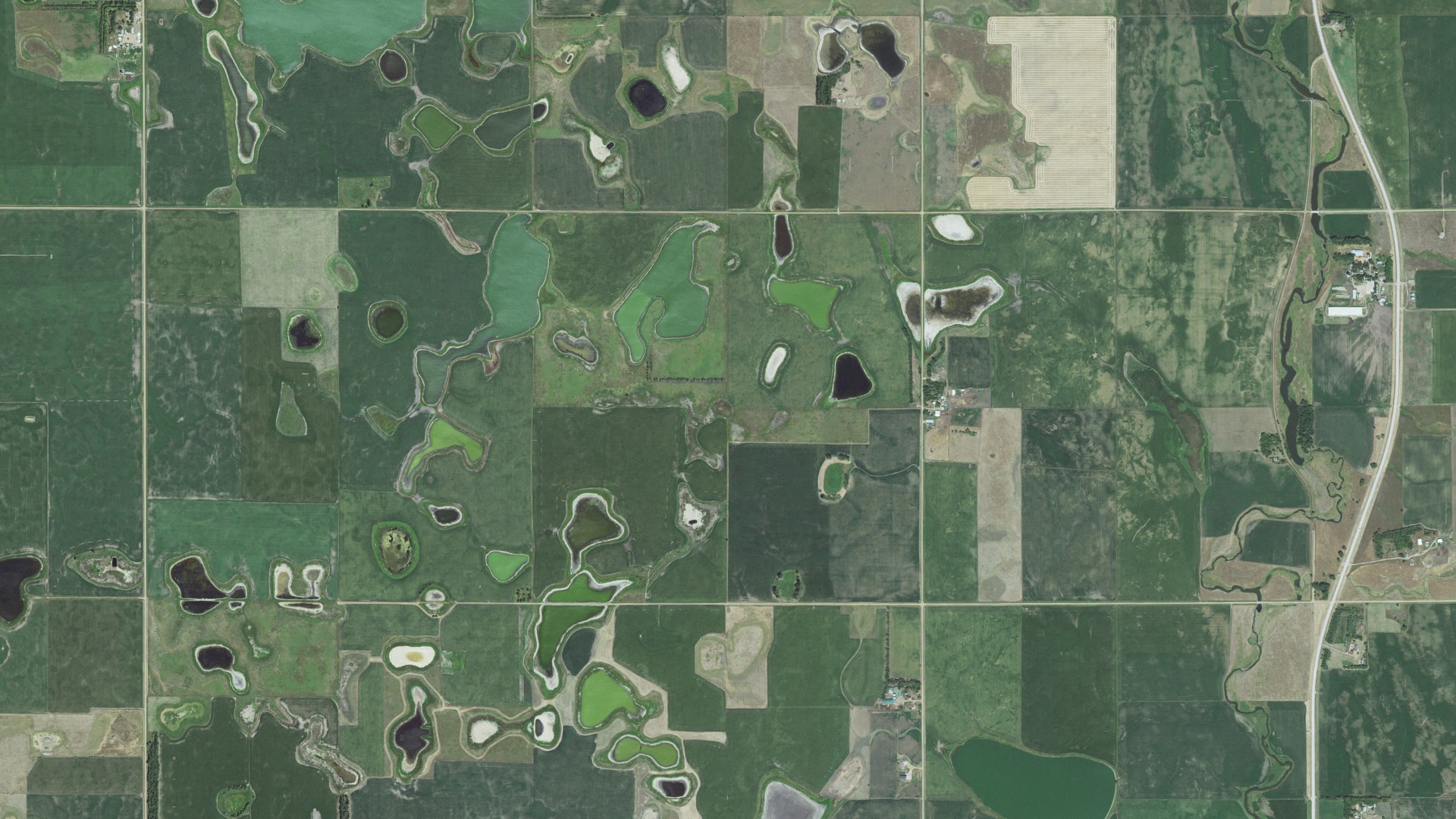 Natural-color aerial photograph of land around Emery, South Dakota