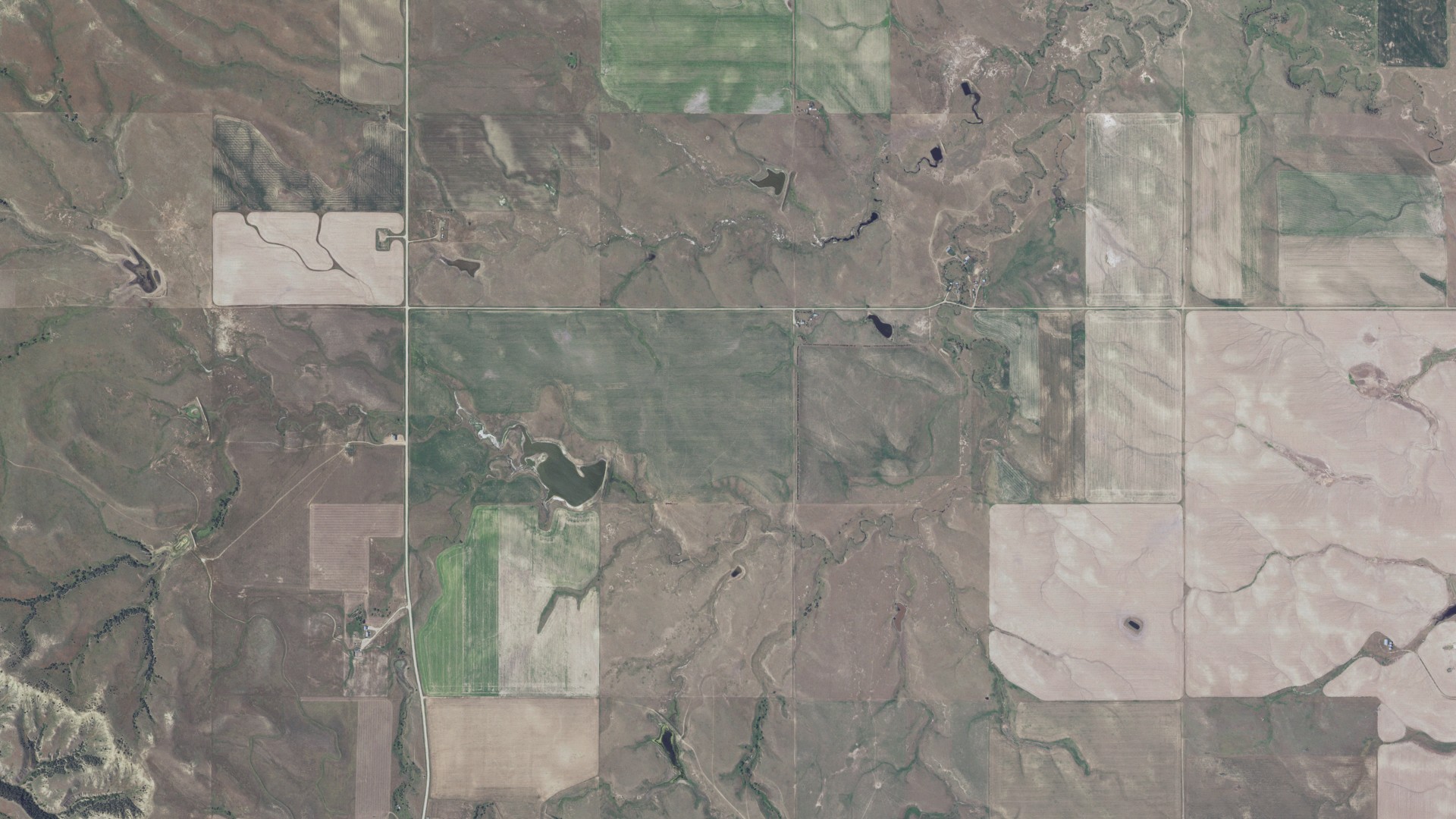 Natural-color aerial photograph of land around Ash, South Dakota