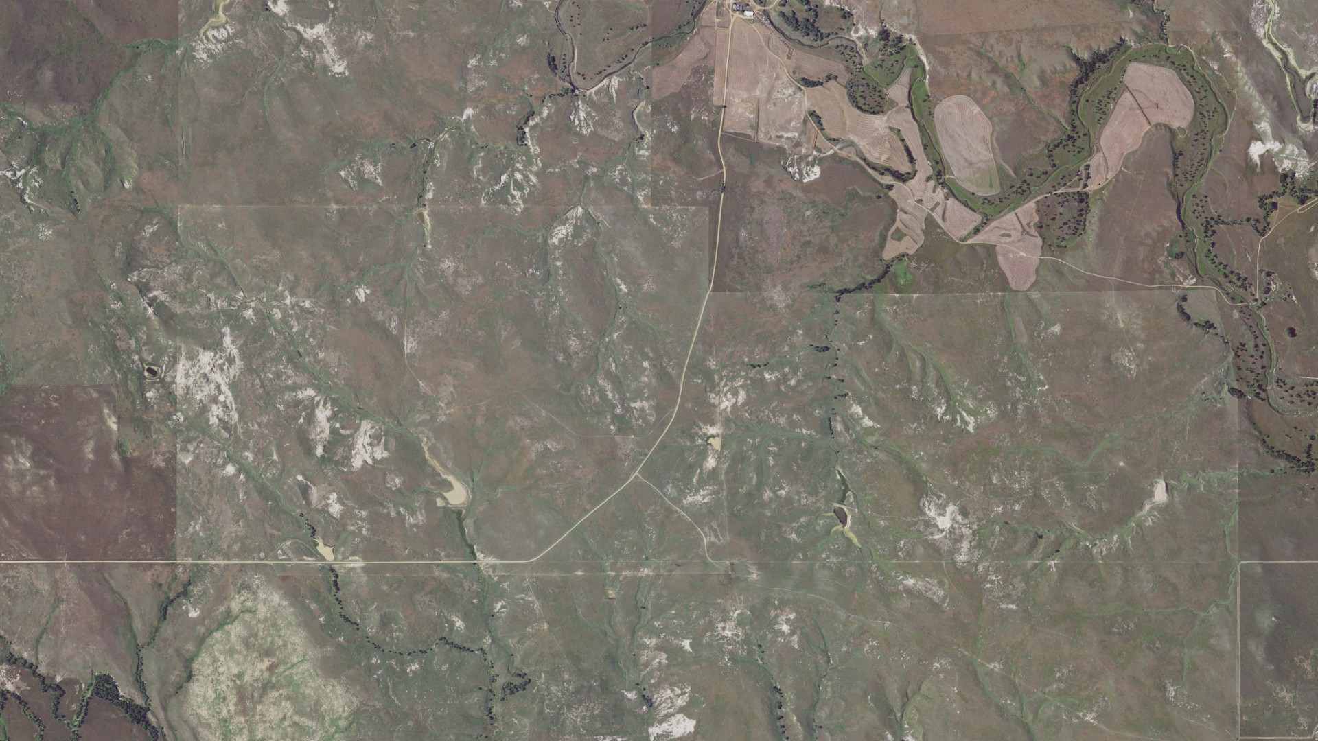 Natural-color aerial photograph of land around Hall, South Dakota