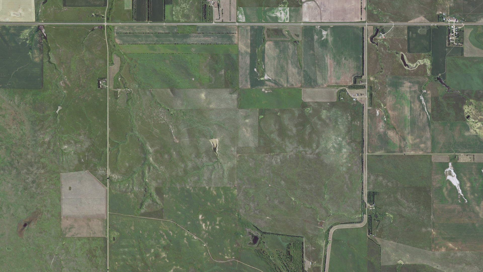Natural-color aerial photograph of land around Meadow, South Dakota