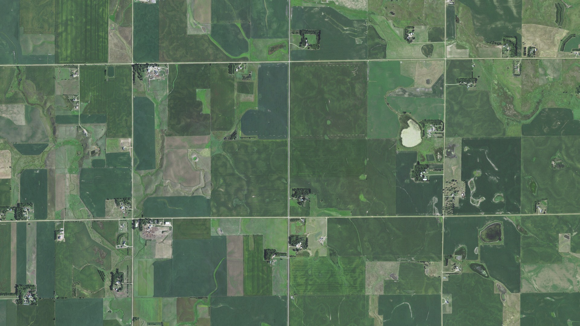 Natural-color aerial photograph of land around Home, South Dakota