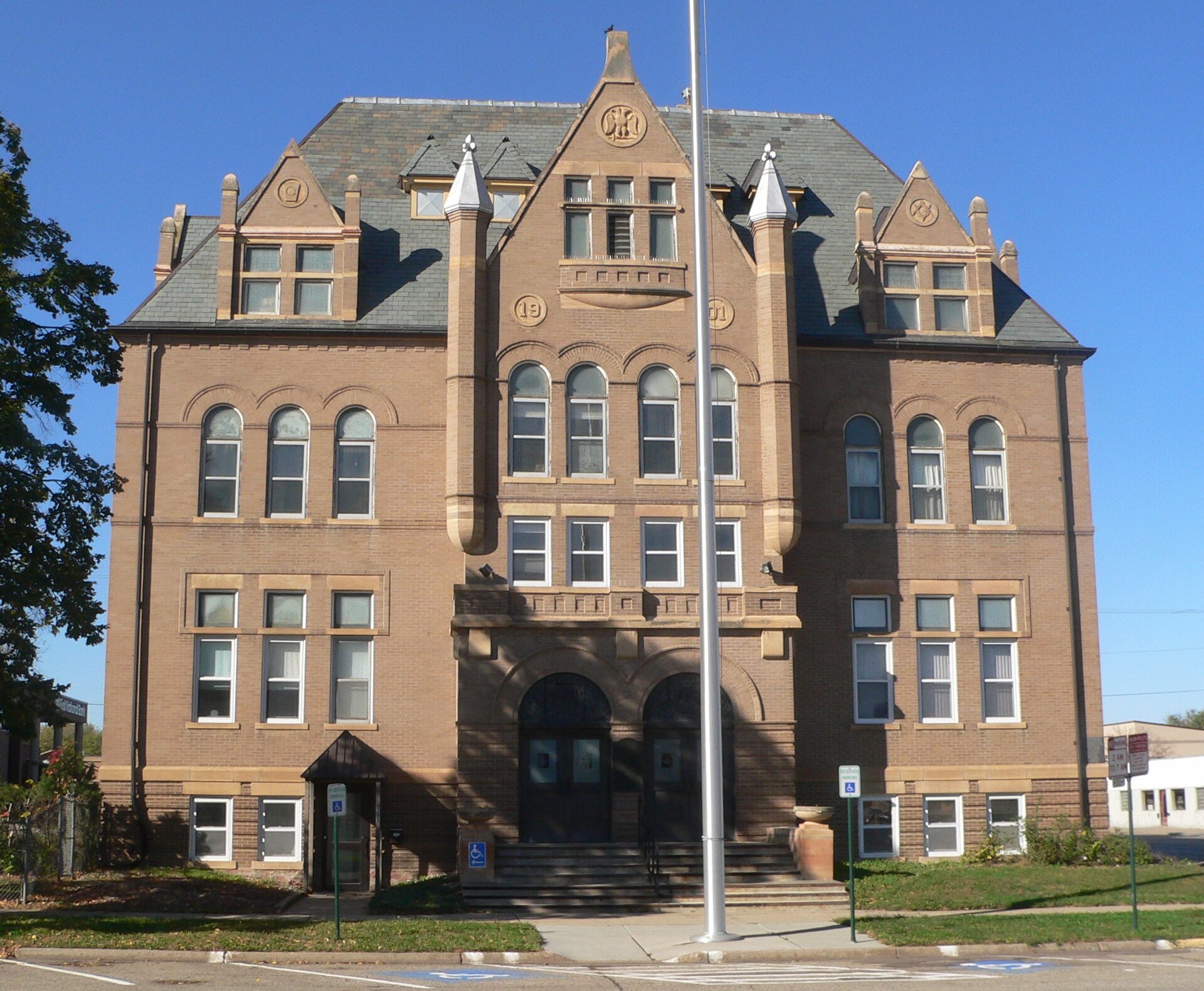 Scottish Rite Masonic Center, located at southwest corner of 4th and Cedar Streets in Yankton, South Dakota; seen from the east, across Cedar. — Yankton County, South Dakota