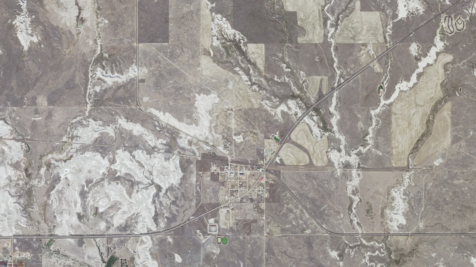 Natural-color aerial photograph of land around Interior, South Dakota