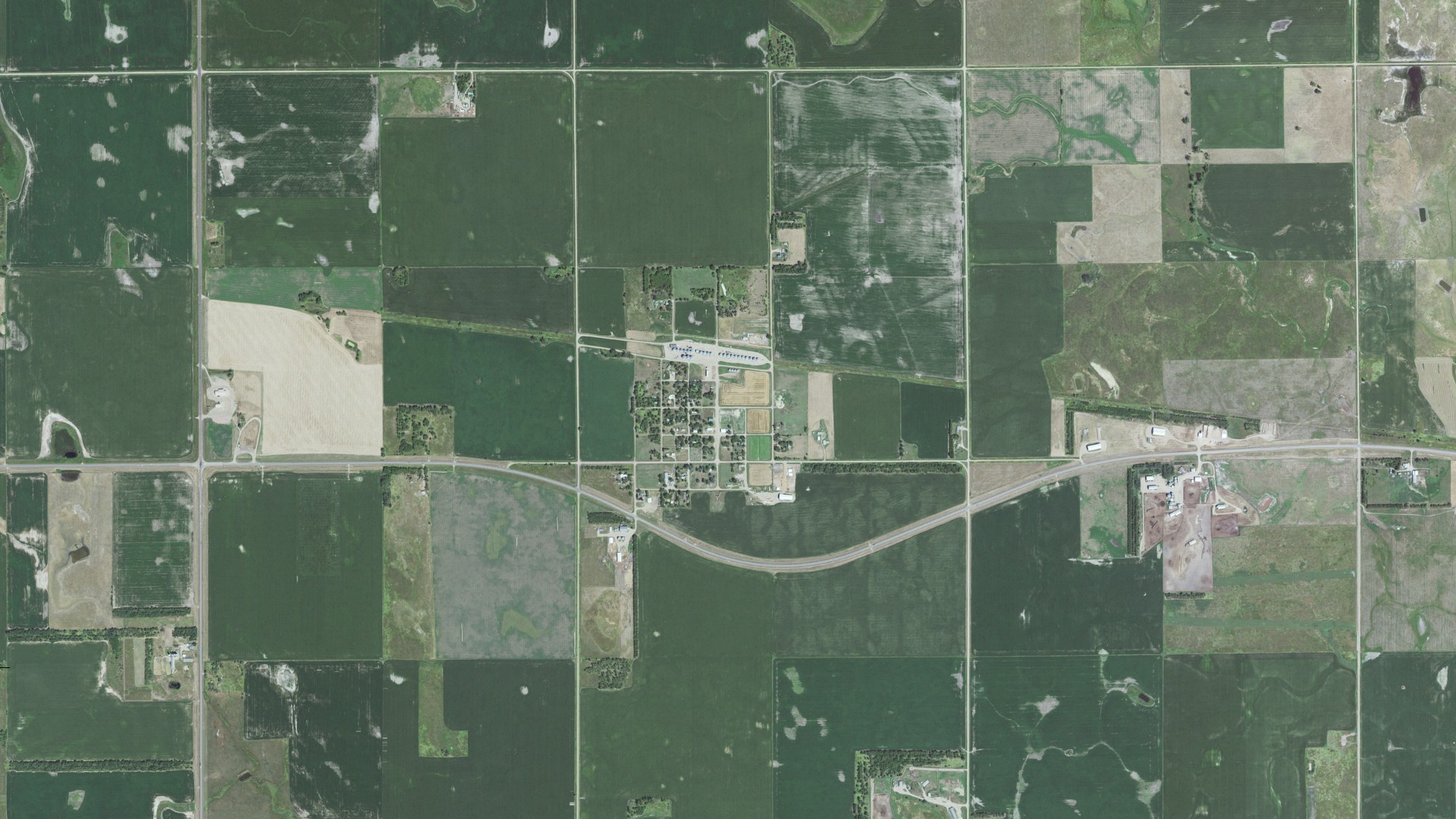 Natural-color aerial photograph of land around Lane, South Dakota