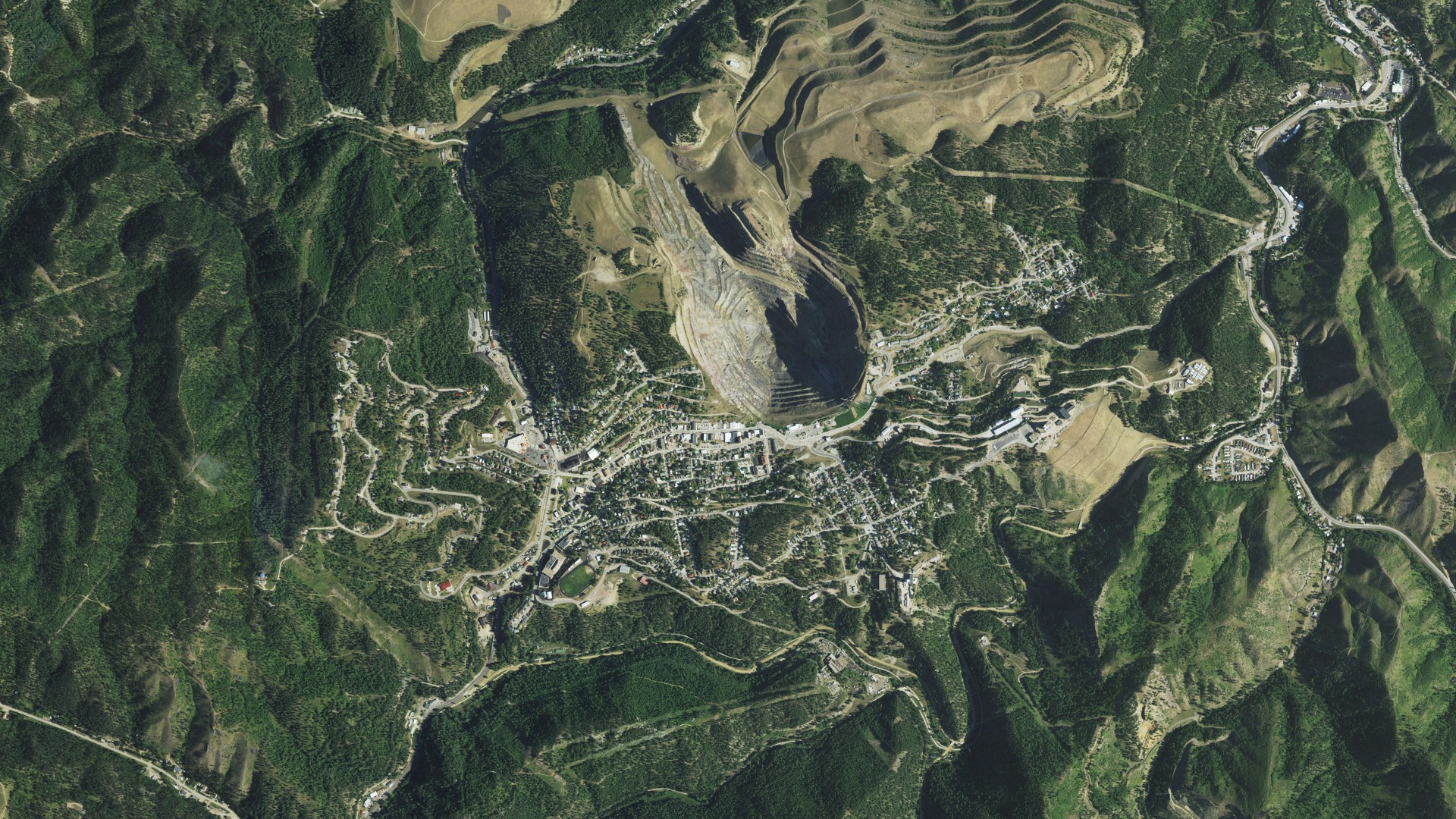 Natural-color aerial photograph of land around Lead, South Dakota