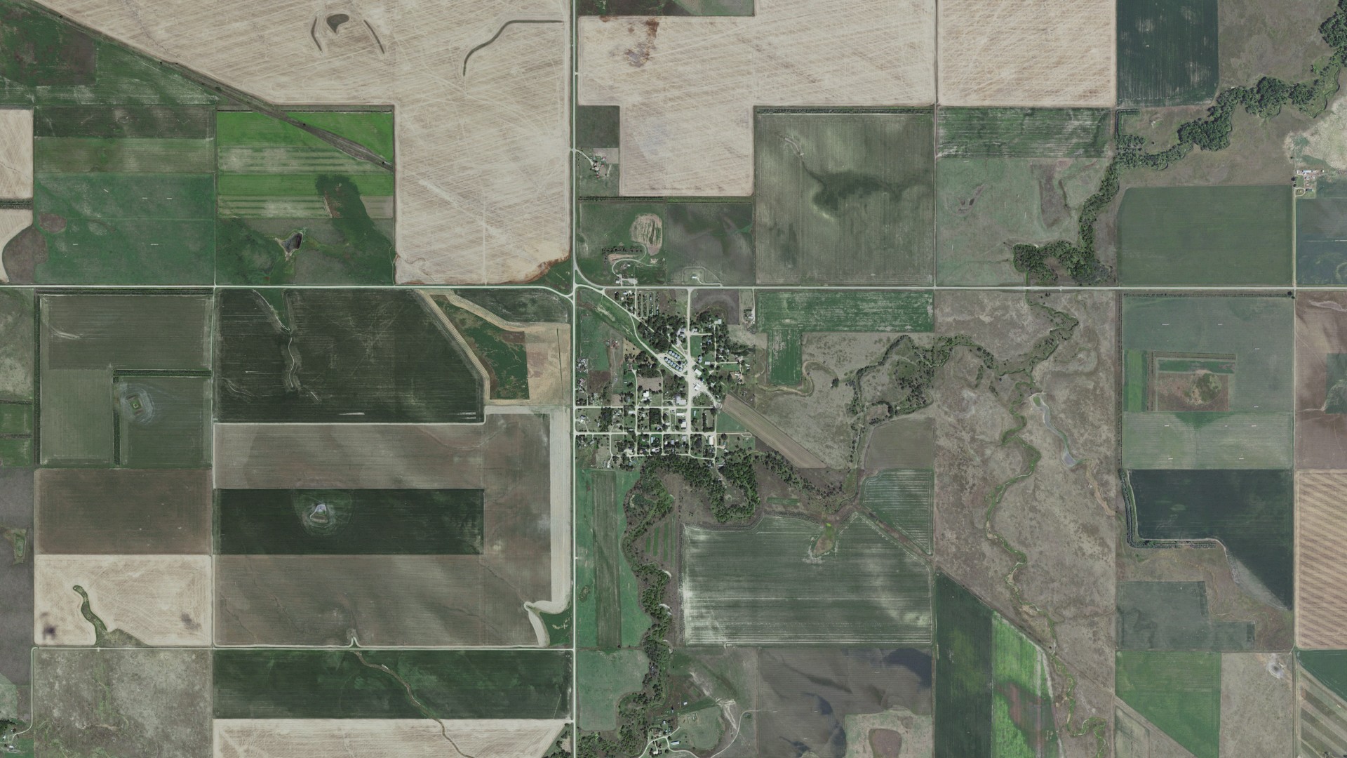 Natural-color aerial photograph of land around New Witten, South Dakota