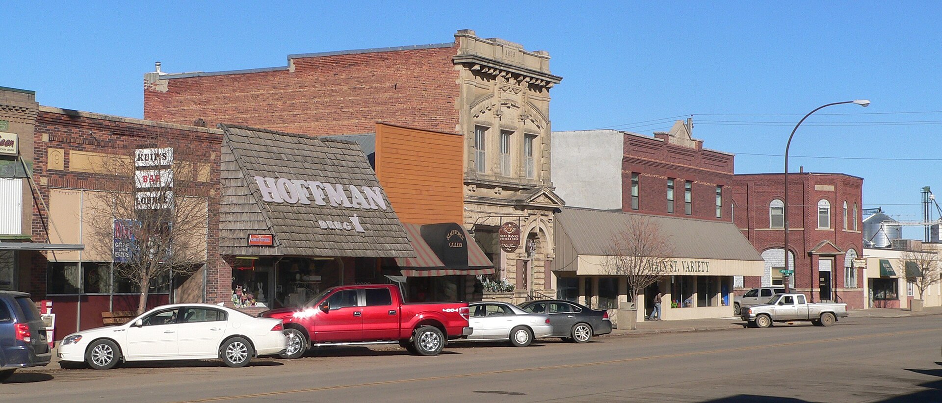 West side of 400s block of Main Street in Platte, South Dakota. Camera is facing northwest from about the junction of 5th Street and Main.