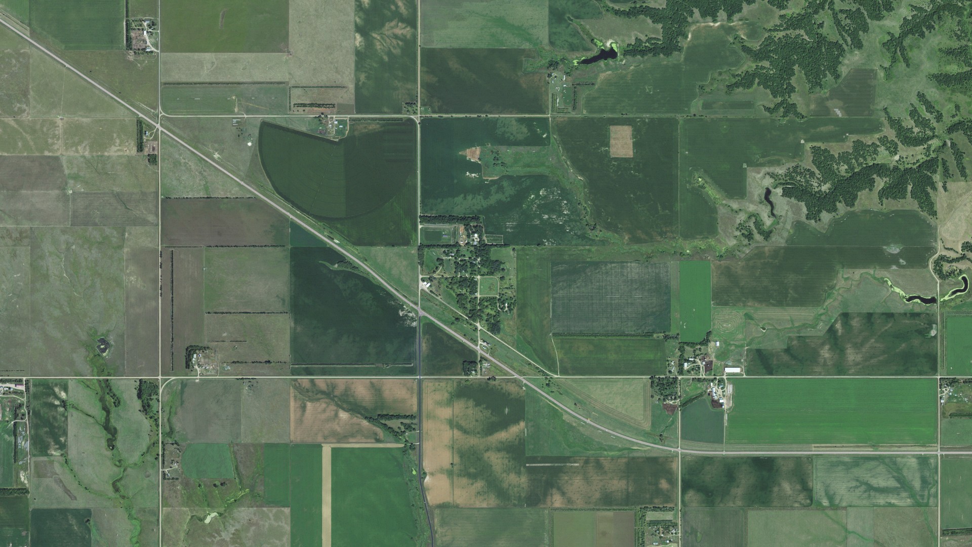 Natural-color aerial photograph of land around St. Charles, South Dakota