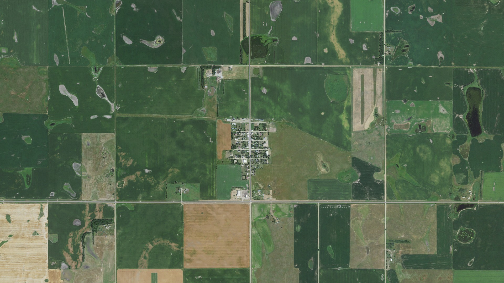 Natural-color aerial photograph of land around Tolstoy, South Dakota