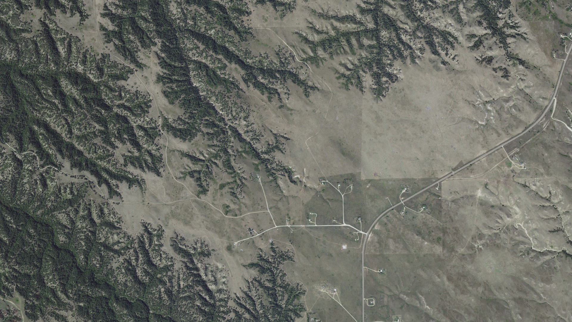 Natural-color aerial photograph of land around Two Strike, South Dakota