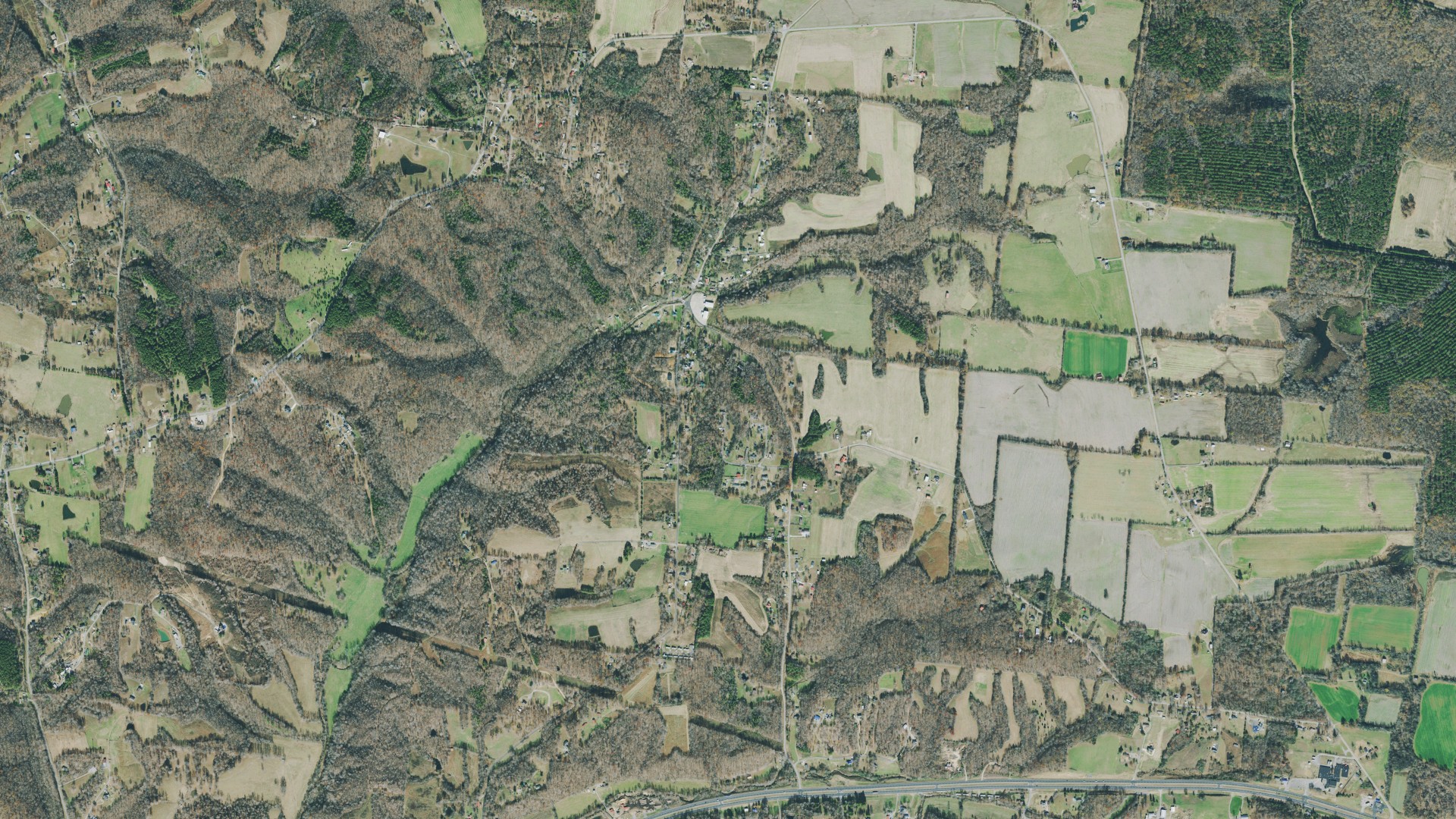 Natural-color aerial photograph of land around Big Rock, Tennessee