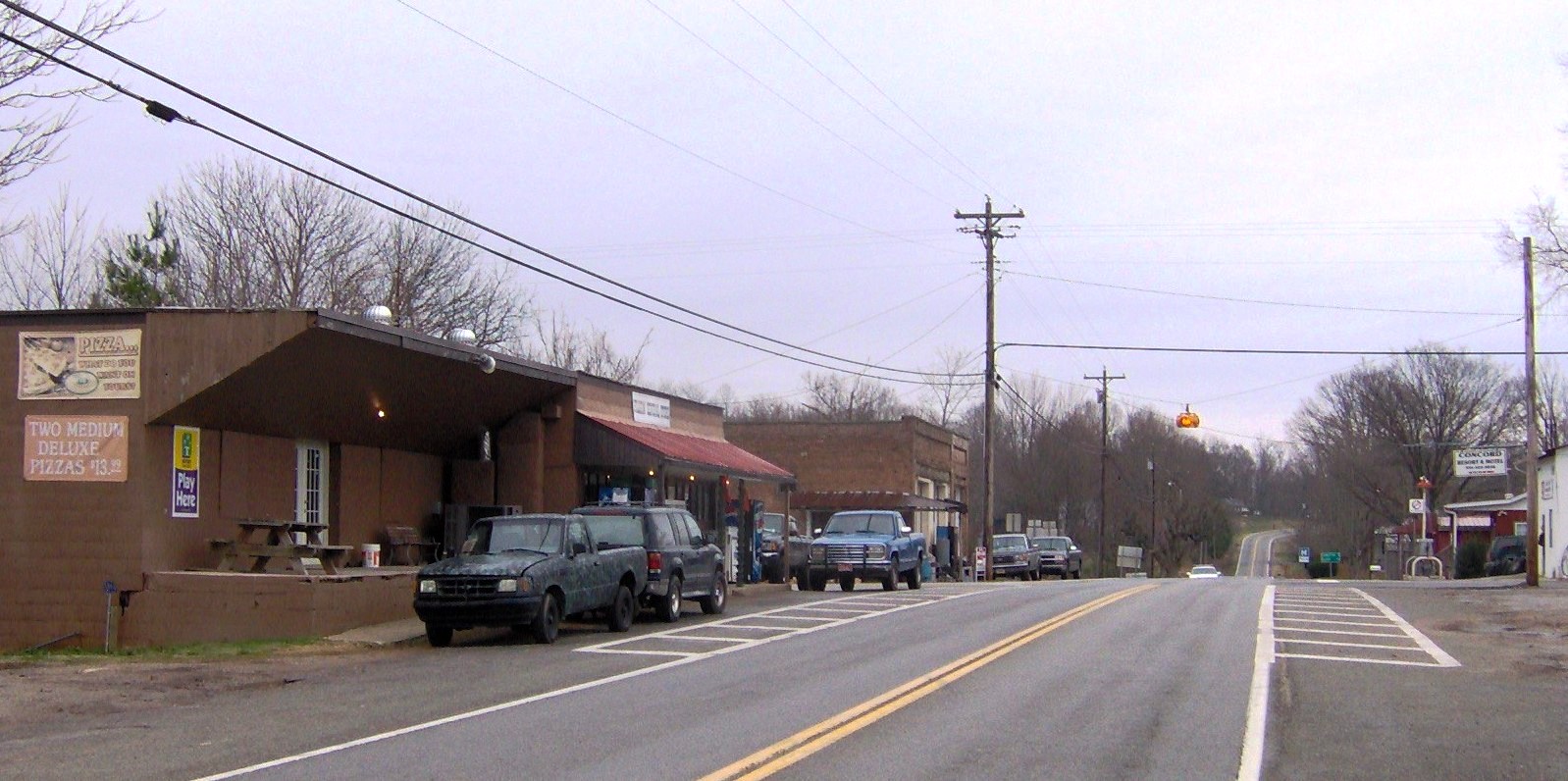 Hilham, Tennessee, in the southeastern United States. This view is looking east along TN-85. The traffic light marks the roads junction with TN-136.