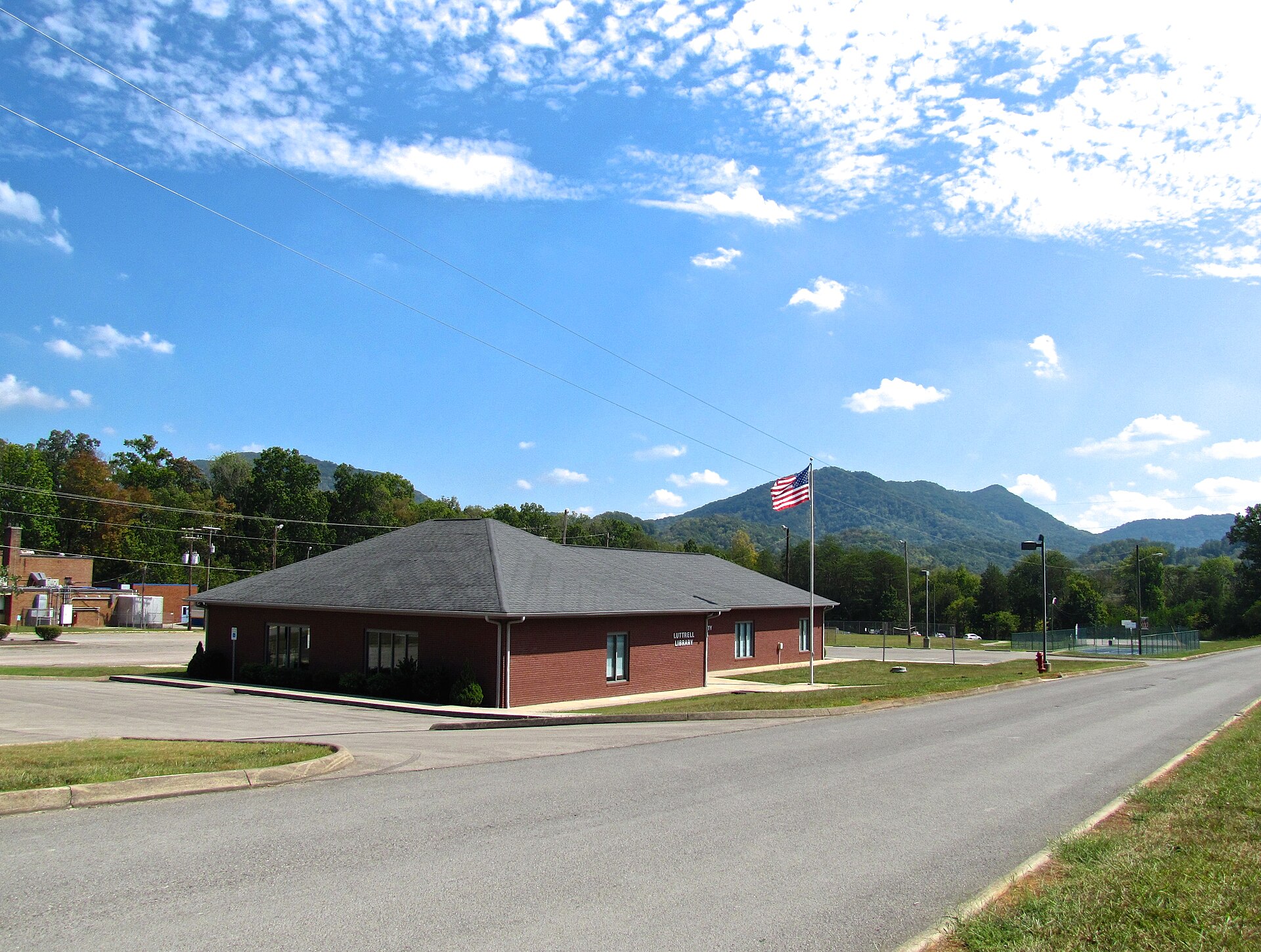 Luttrell Library in Luttrell, Tennessee, United States. Clinch Mountain rises in the background.