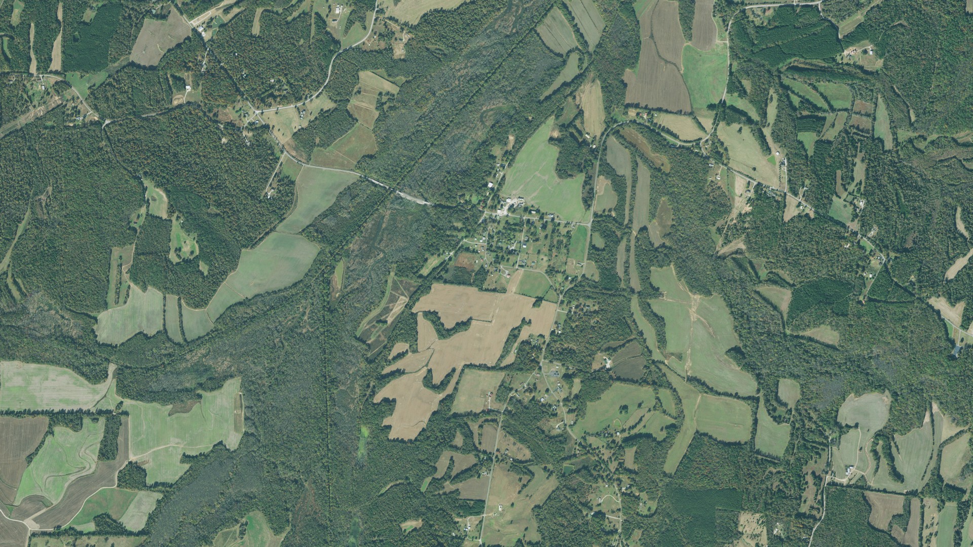 Natural-color aerial photograph of land around Yuma, Tennessee