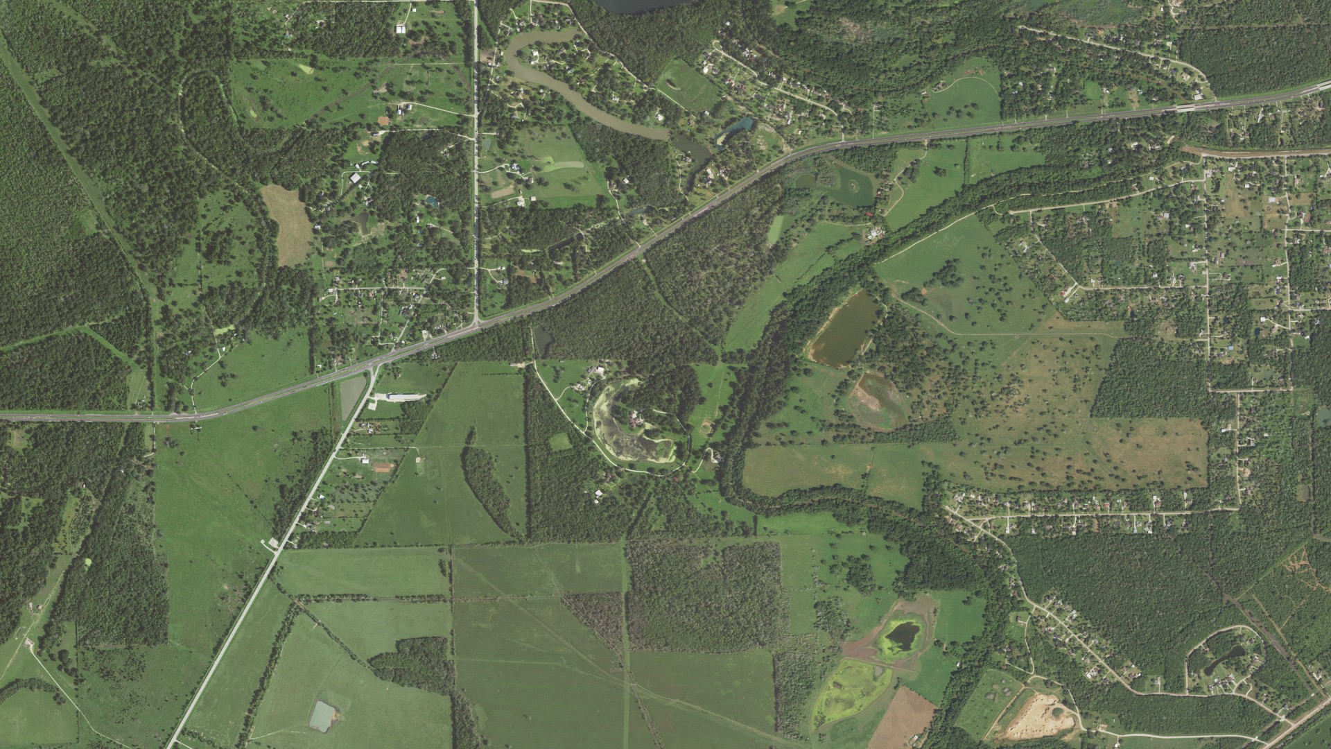 Natural-color aerial photograph of land around Bailey's Prairie, Texas