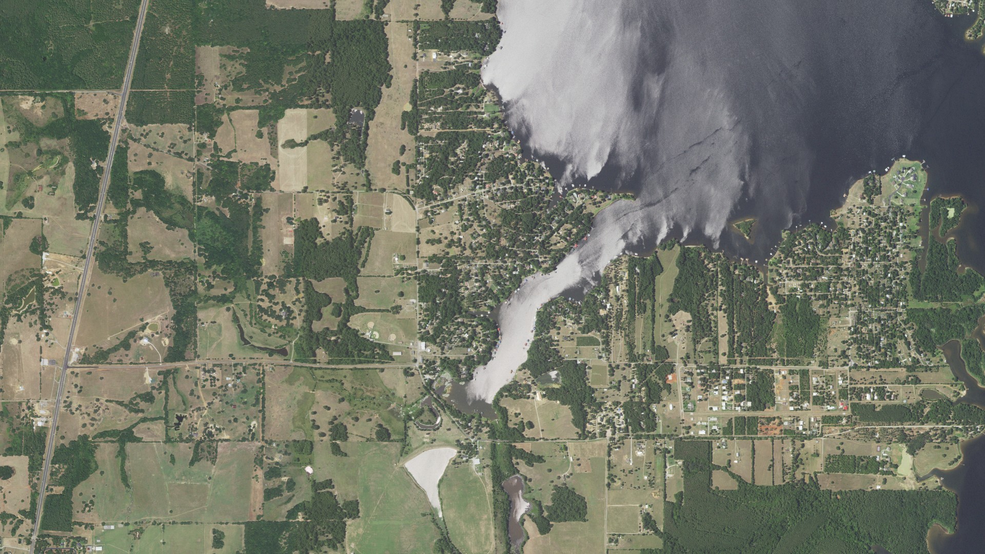 Natural-color aerial photograph of land around Berryville, Texas