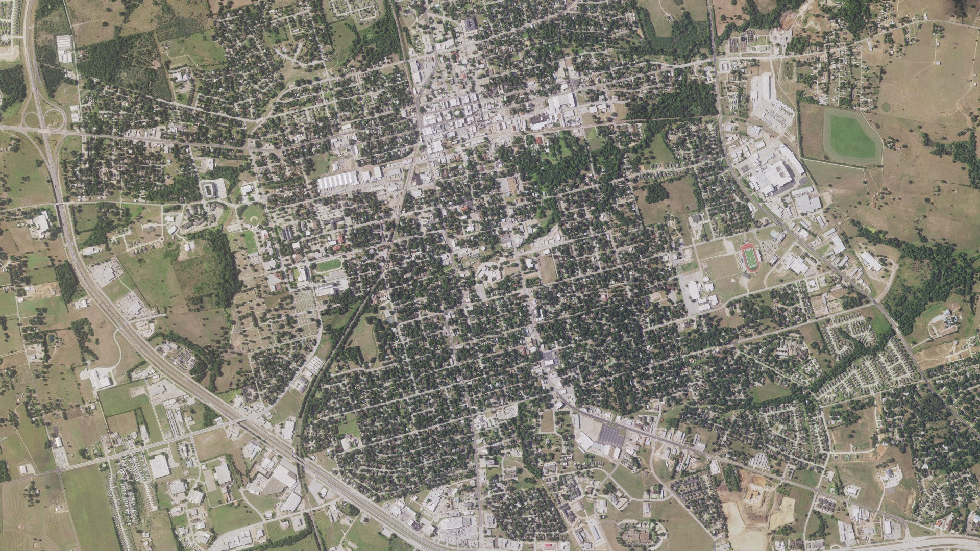 Natural-color aerial photograph of land around Brenham, Texas