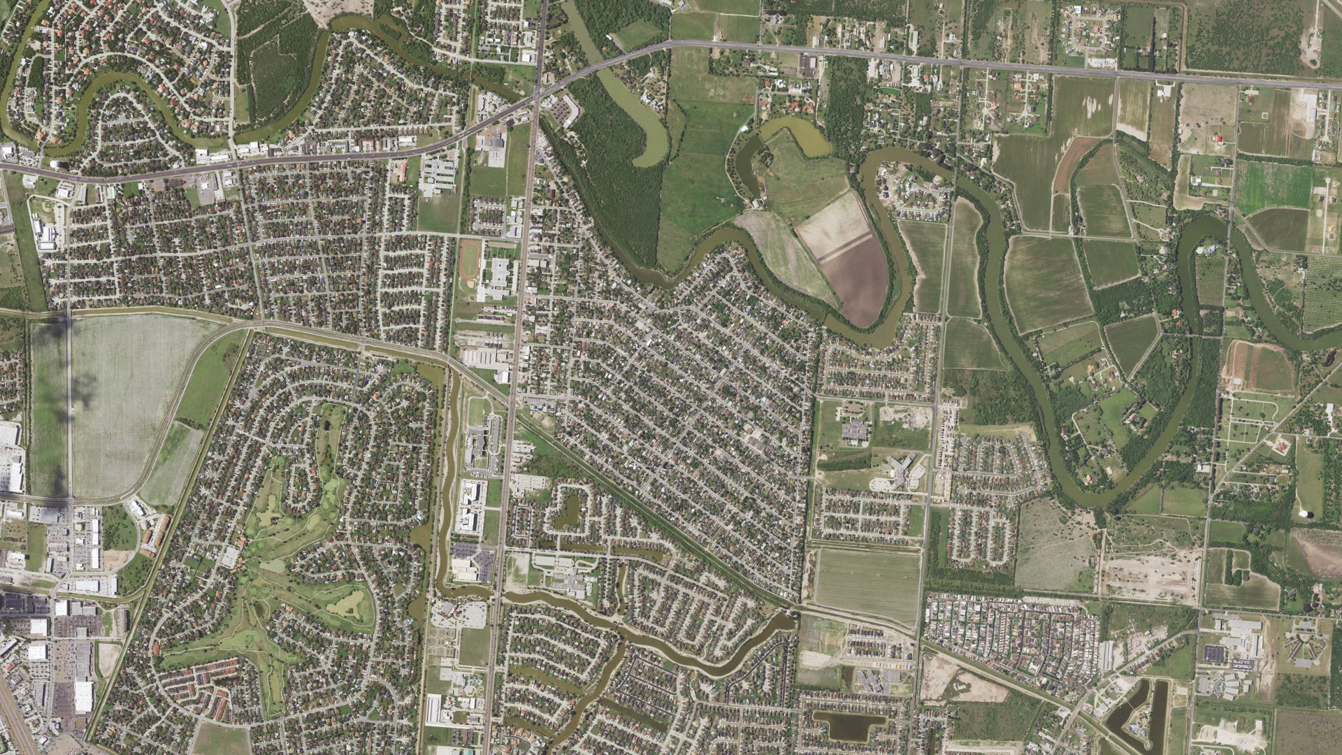 Natural-color aerial photograph of land around Cameron Park, Texas