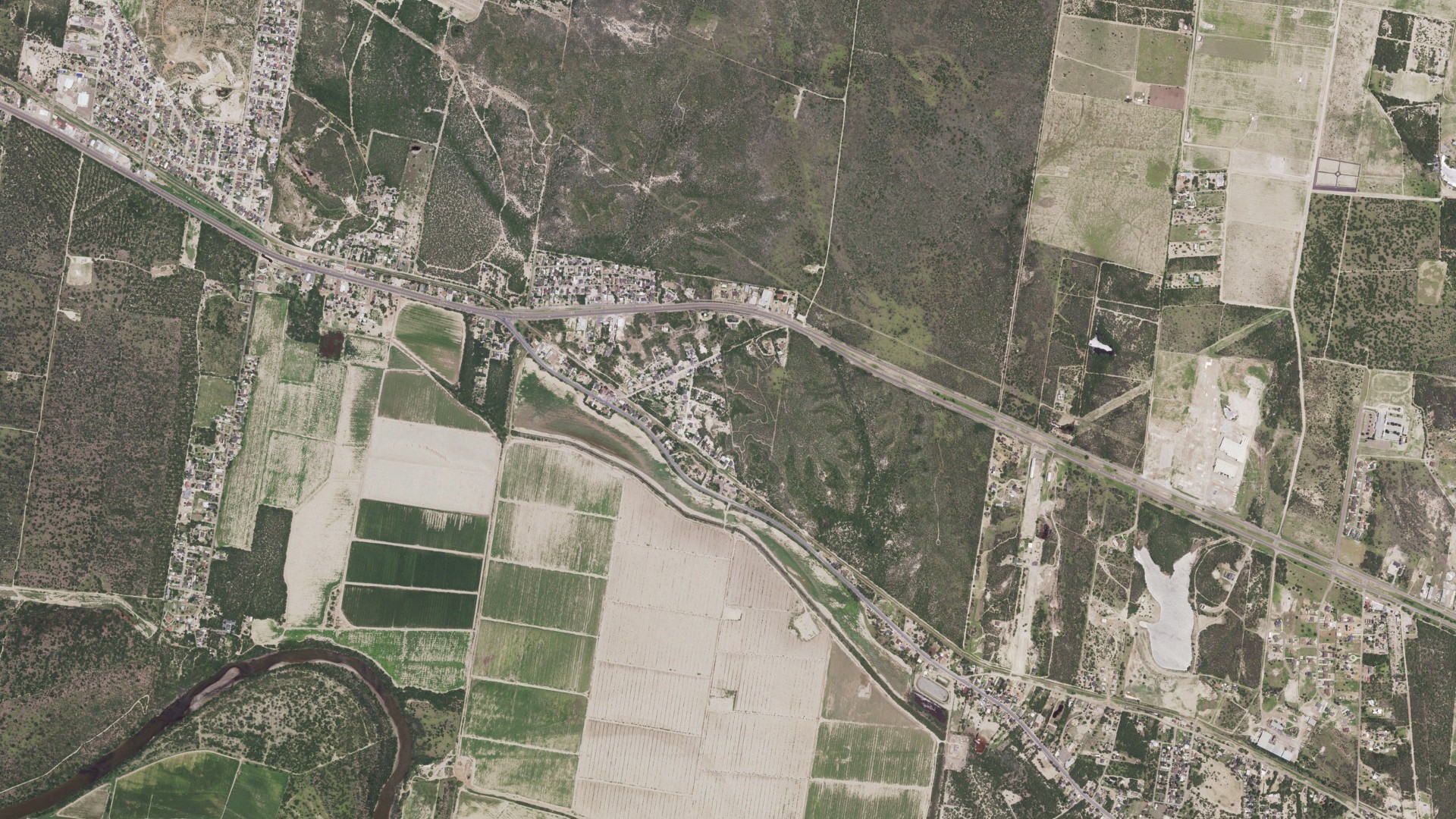 Natural-color aerial photograph of land around Chaparrito, Texas
