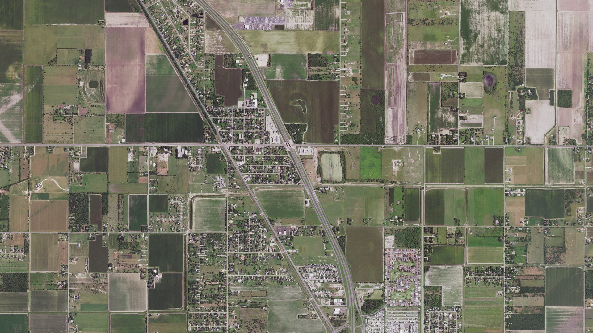 Natural-color aerial photograph of land around Combes, Texas