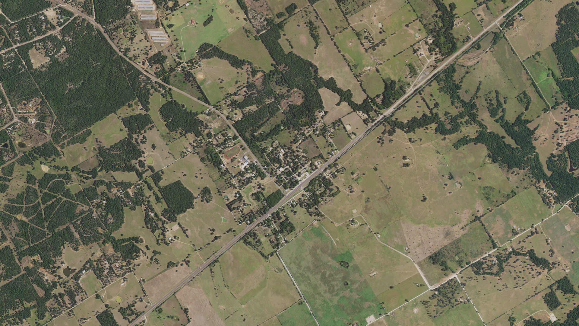 Natural-color aerial photograph of land around Gause, Texas