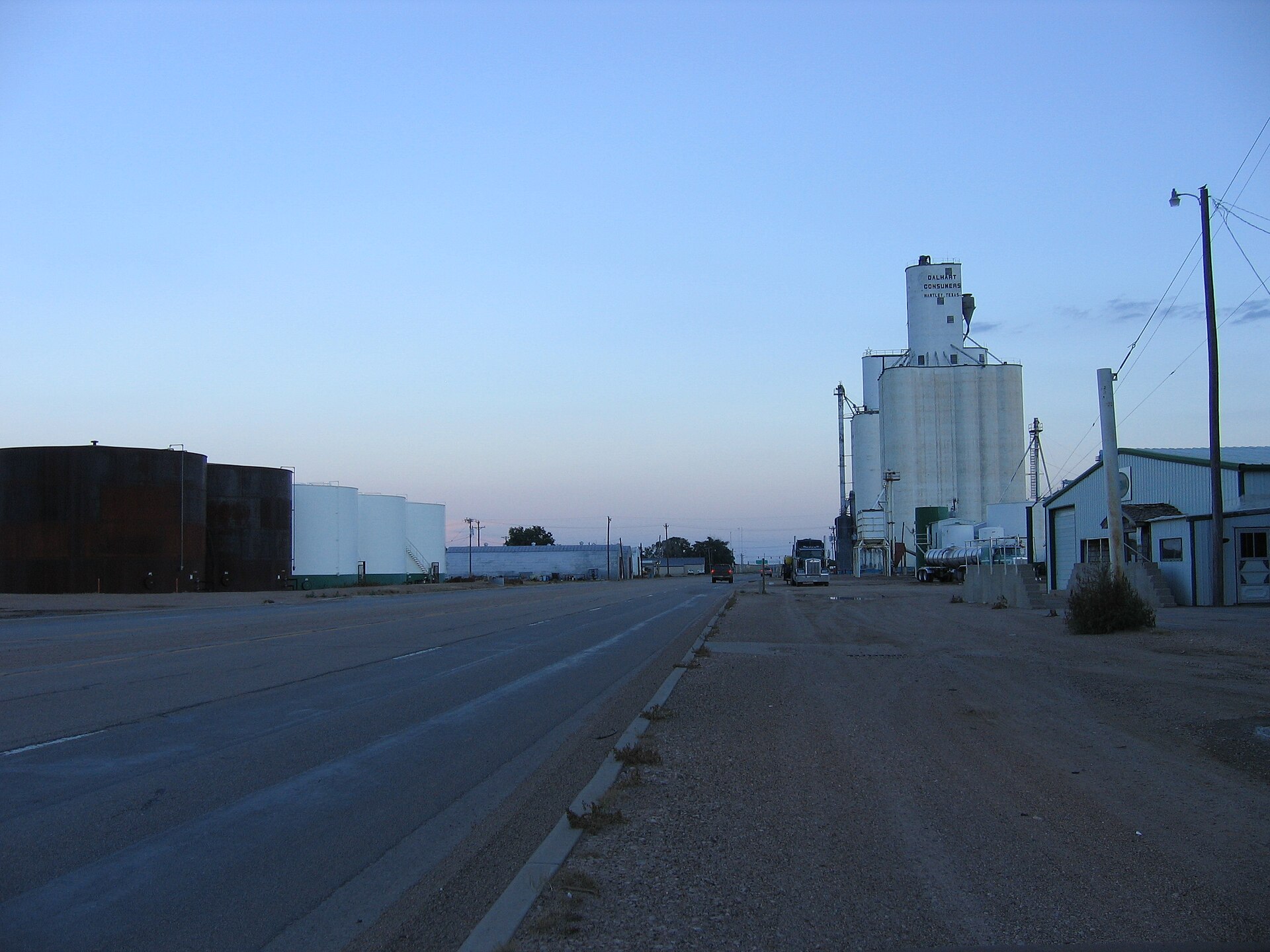 U.S. Highway 287 going through Hartley, Texas. Dalhart Consumers and Hartley Feeders are two large businesses locations here.