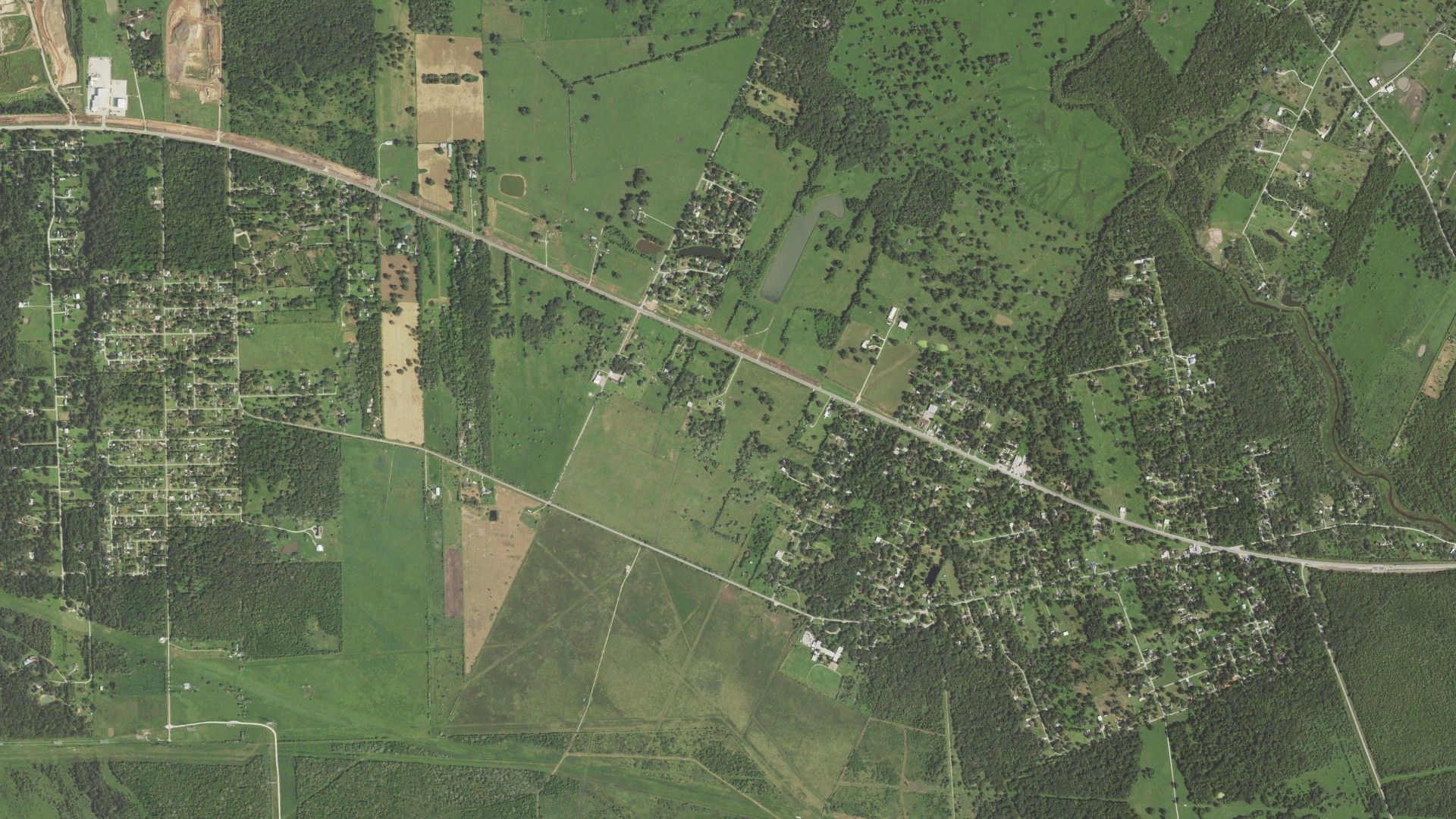 Natural-color aerial photograph of land around Jones Creek, Texas