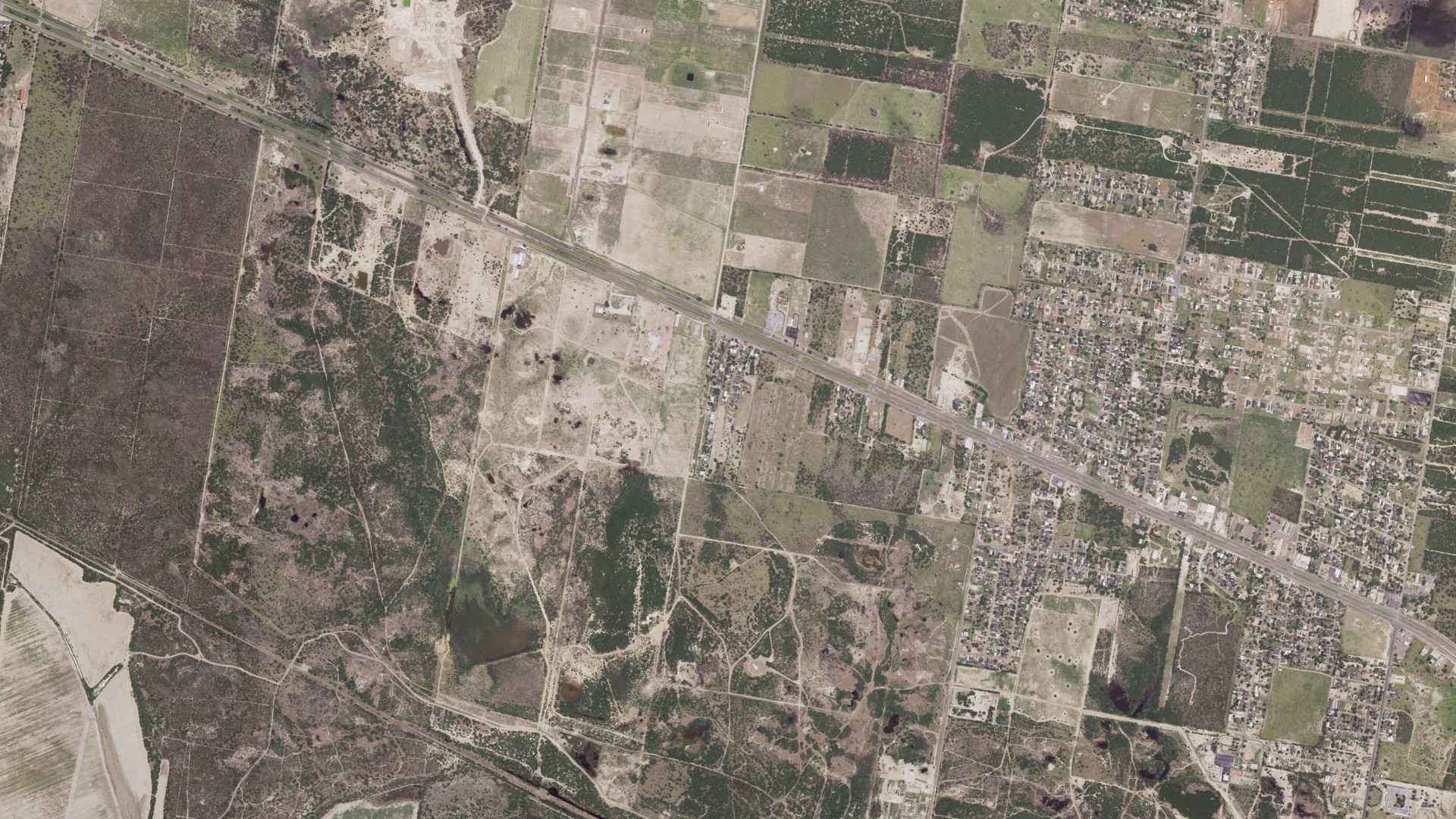 Natural-color aerial photograph of land around Nina, Texas