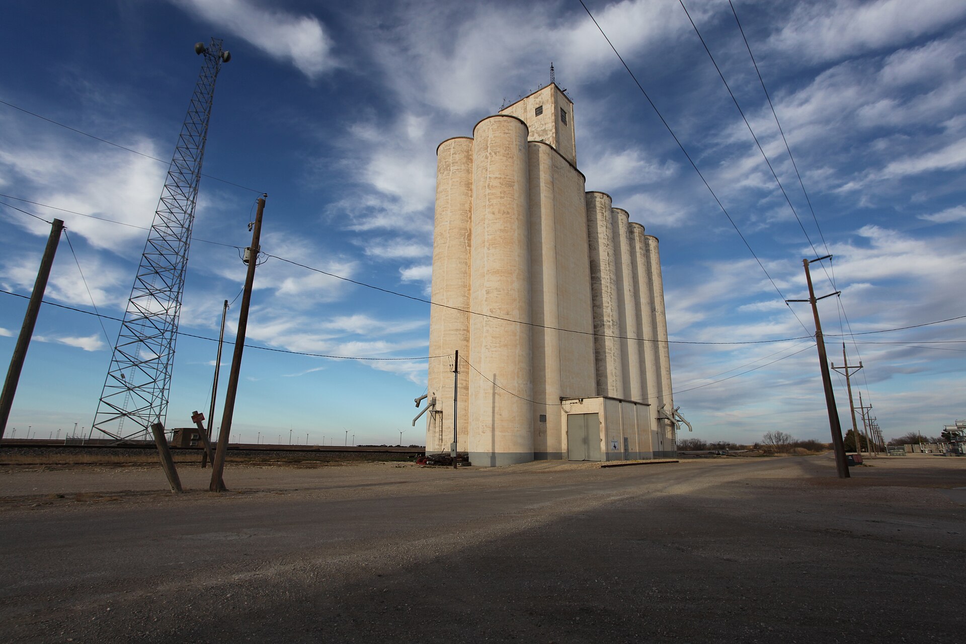 Plowboy grain elevator beside the tracks in Roscoe, Texas.