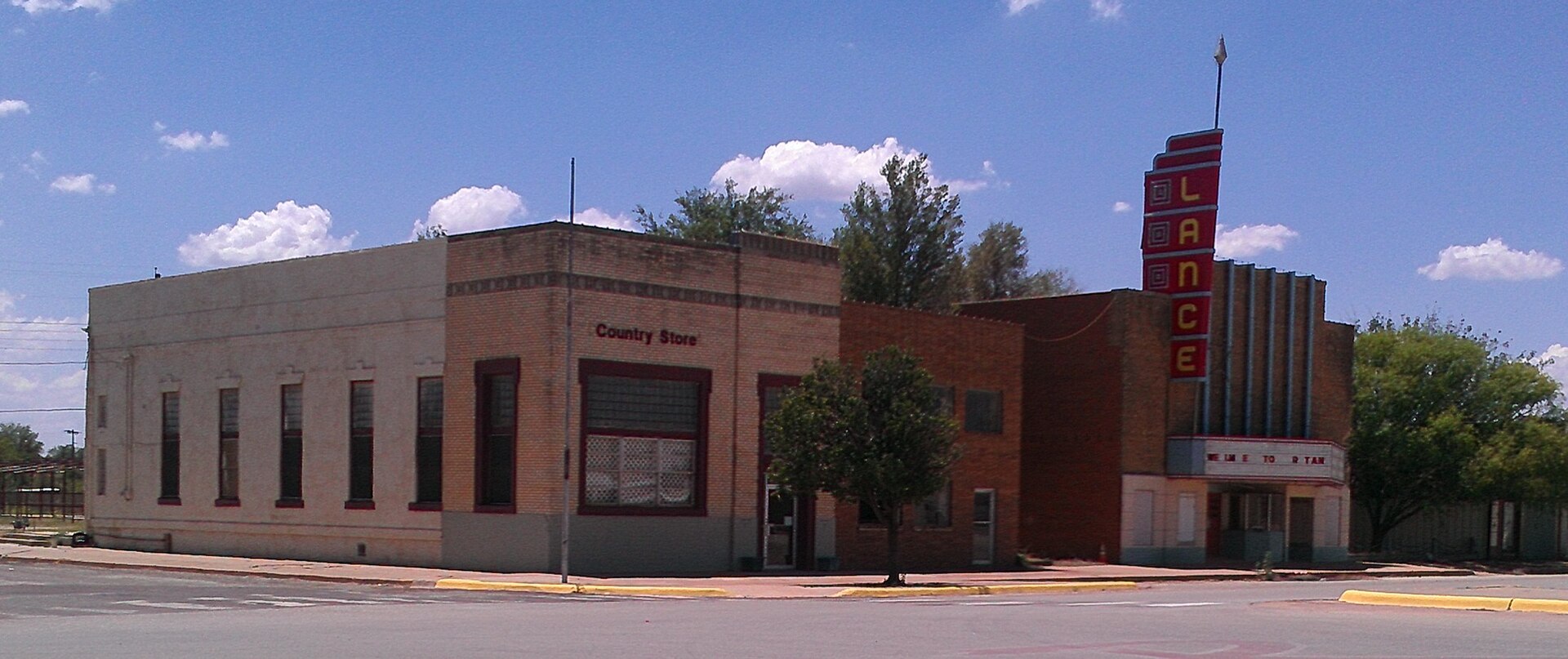 The neglected Lance Theater in Rotan, Texas. The sign reads, "We lm e to R tan."