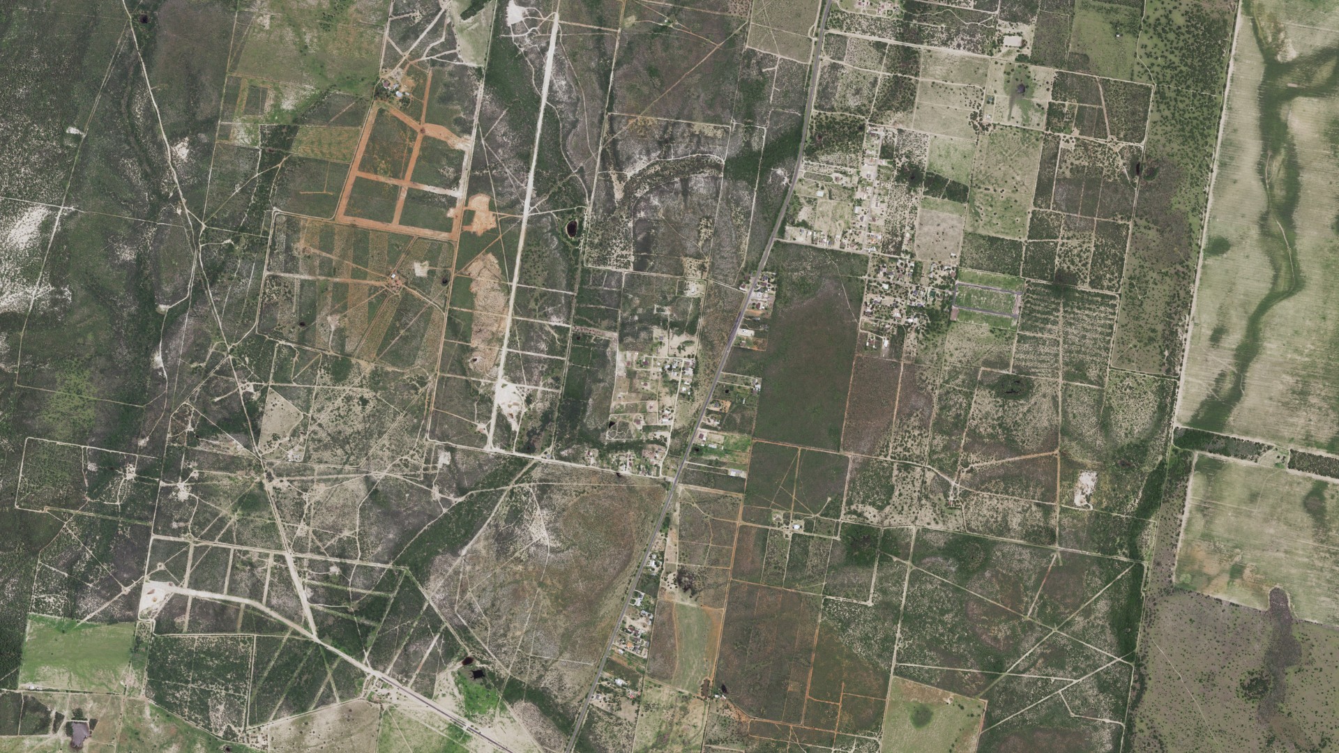 Natural-color aerial photograph of land around Sammy Martinez, Texas