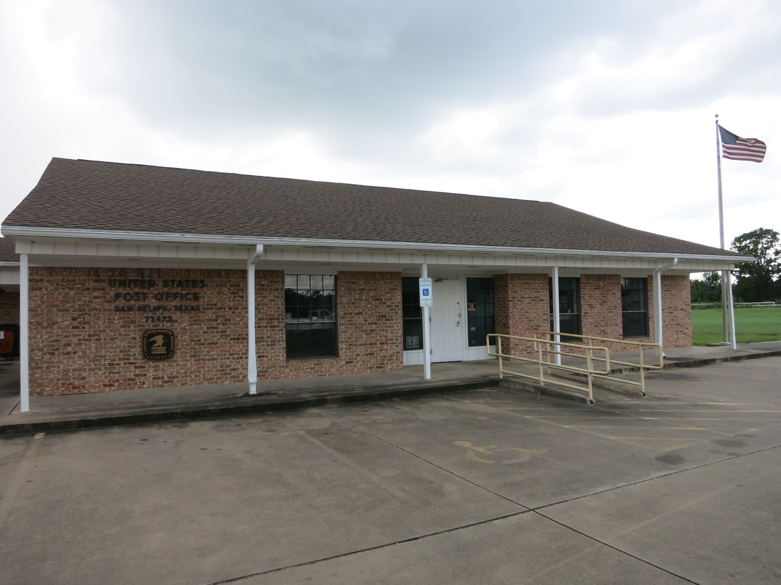 Photo shows the US Post Office at FM 1458 and Campo Santo Street in San Felipe, Texas. View is to the northwest.