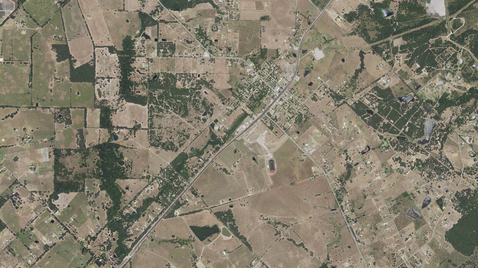 Natural-color aerial photograph of land around Scurry, Texas
