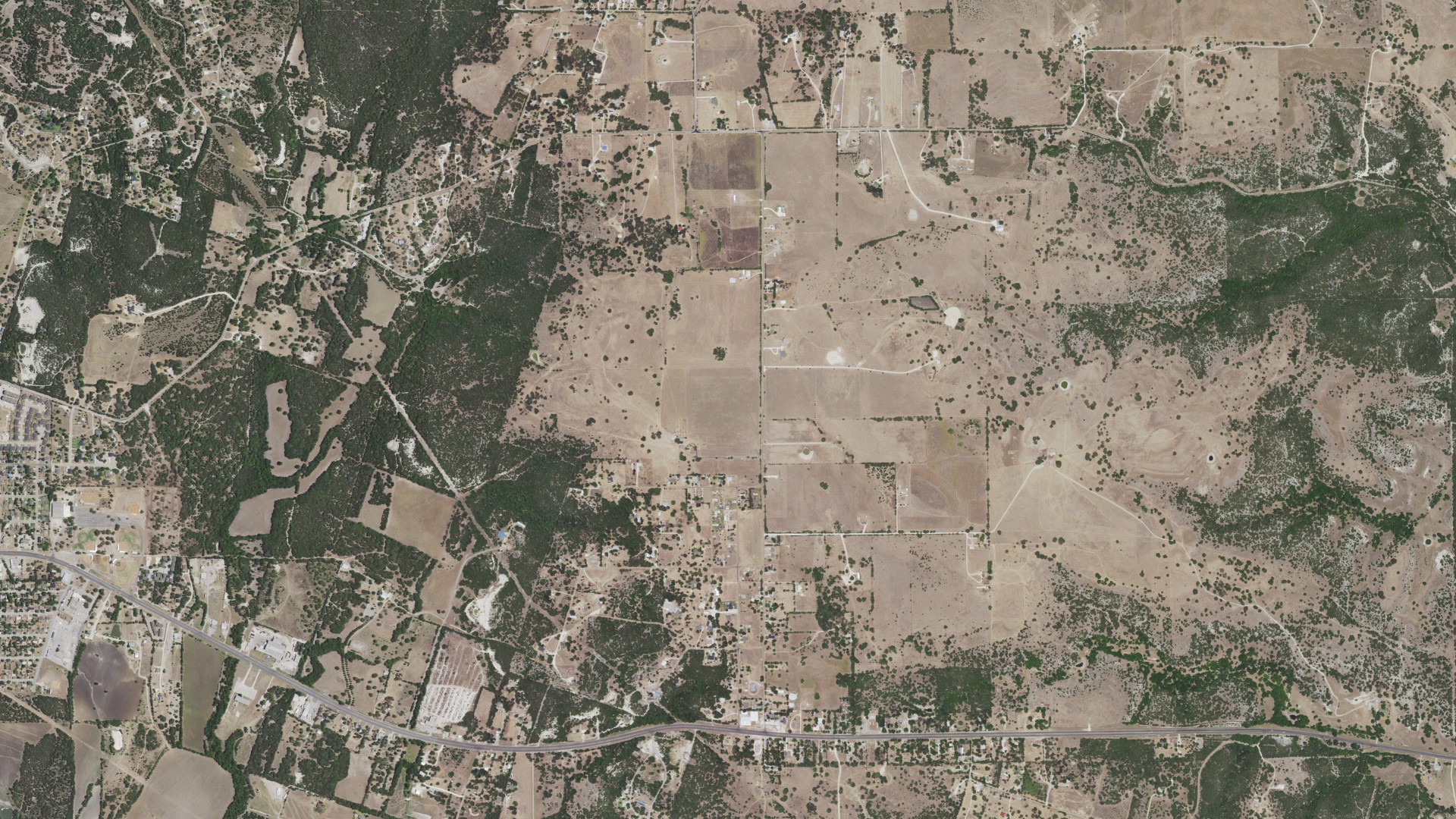 Natural-color aerial photograph of land around South Mountain, Texas