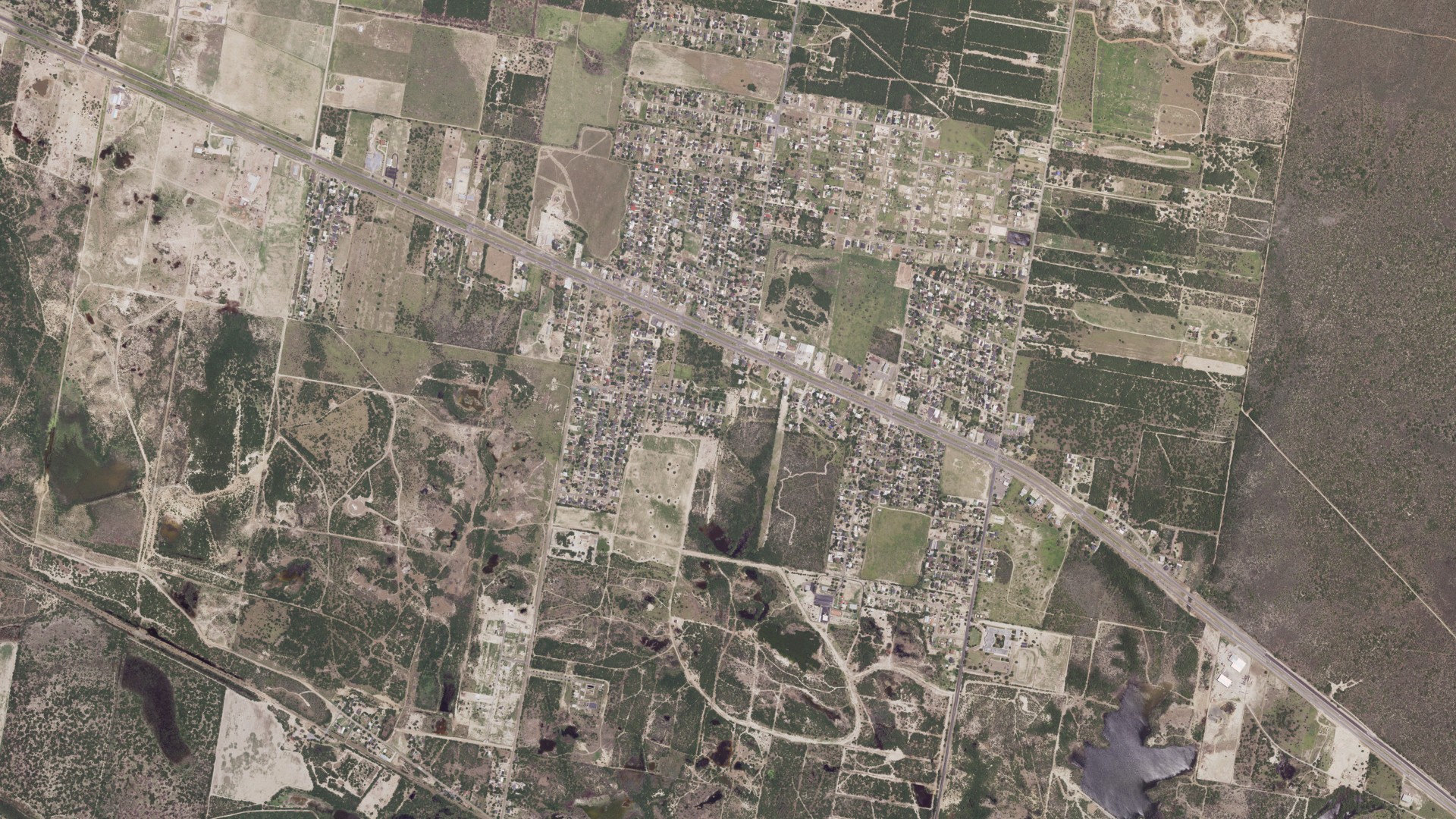 Natural-color aerial photograph of land around Sullivan City, Texas