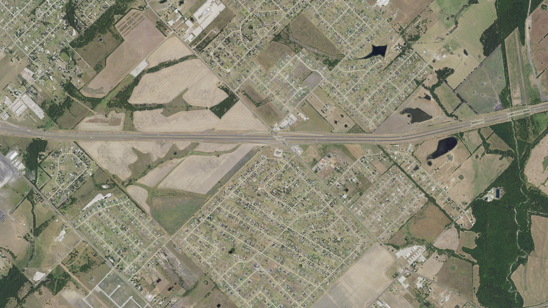 Natural-color aerial photograph of land around Talty, Texas