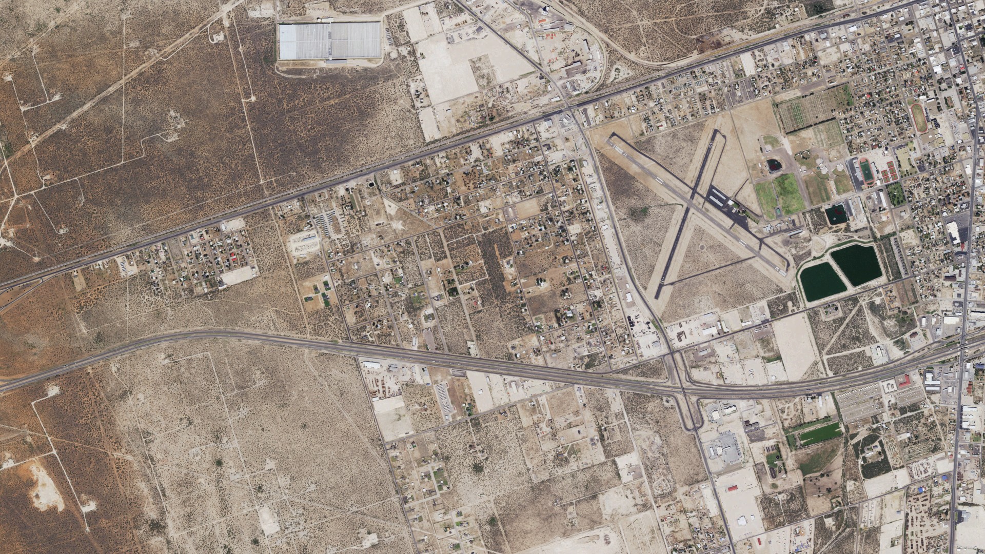 Natural-color aerial photograph of land around Thorntonville, Texas