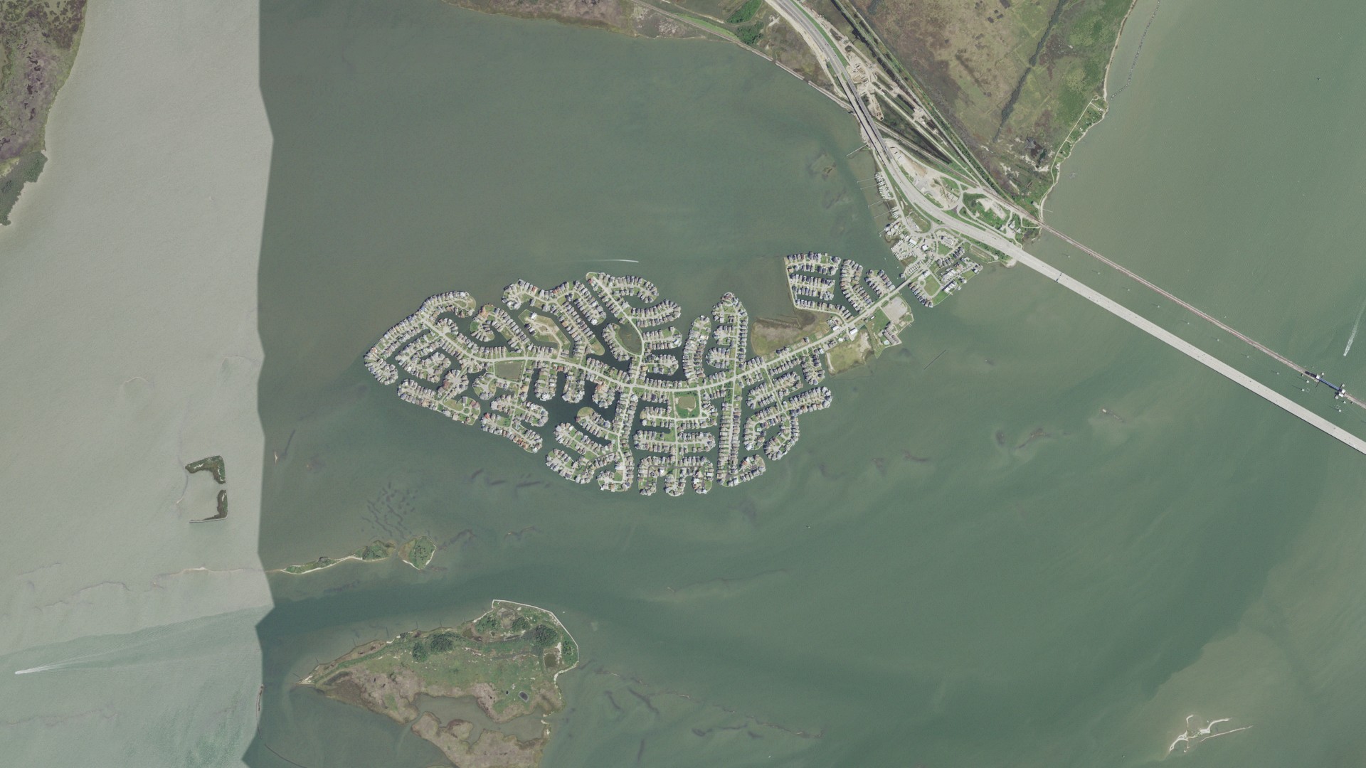 Natural-color aerial photograph of land around Tiki Island, Texas