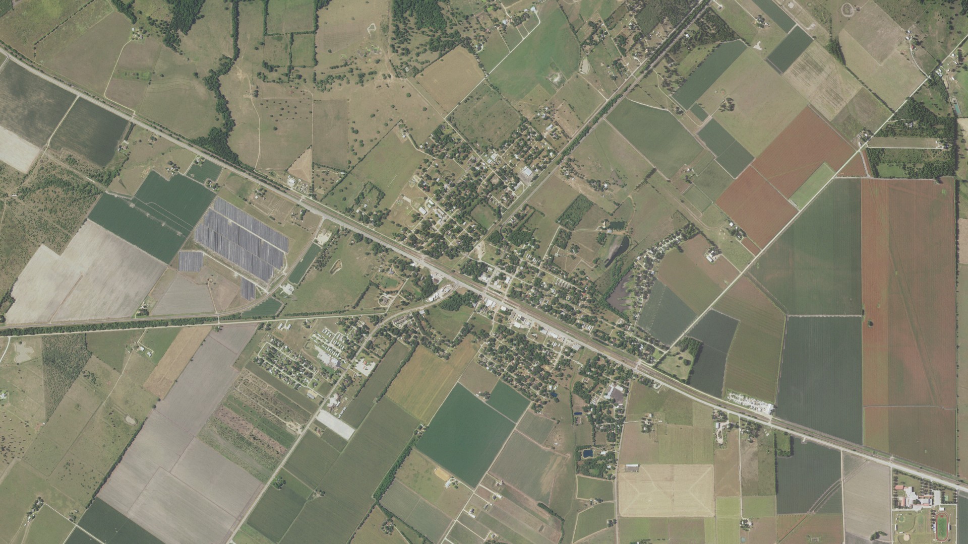Natural-color aerial photograph of land around Wallis, Texas