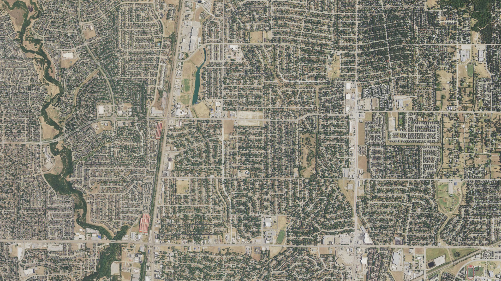 Natural-color aerial photograph of land around Watauga, Texas