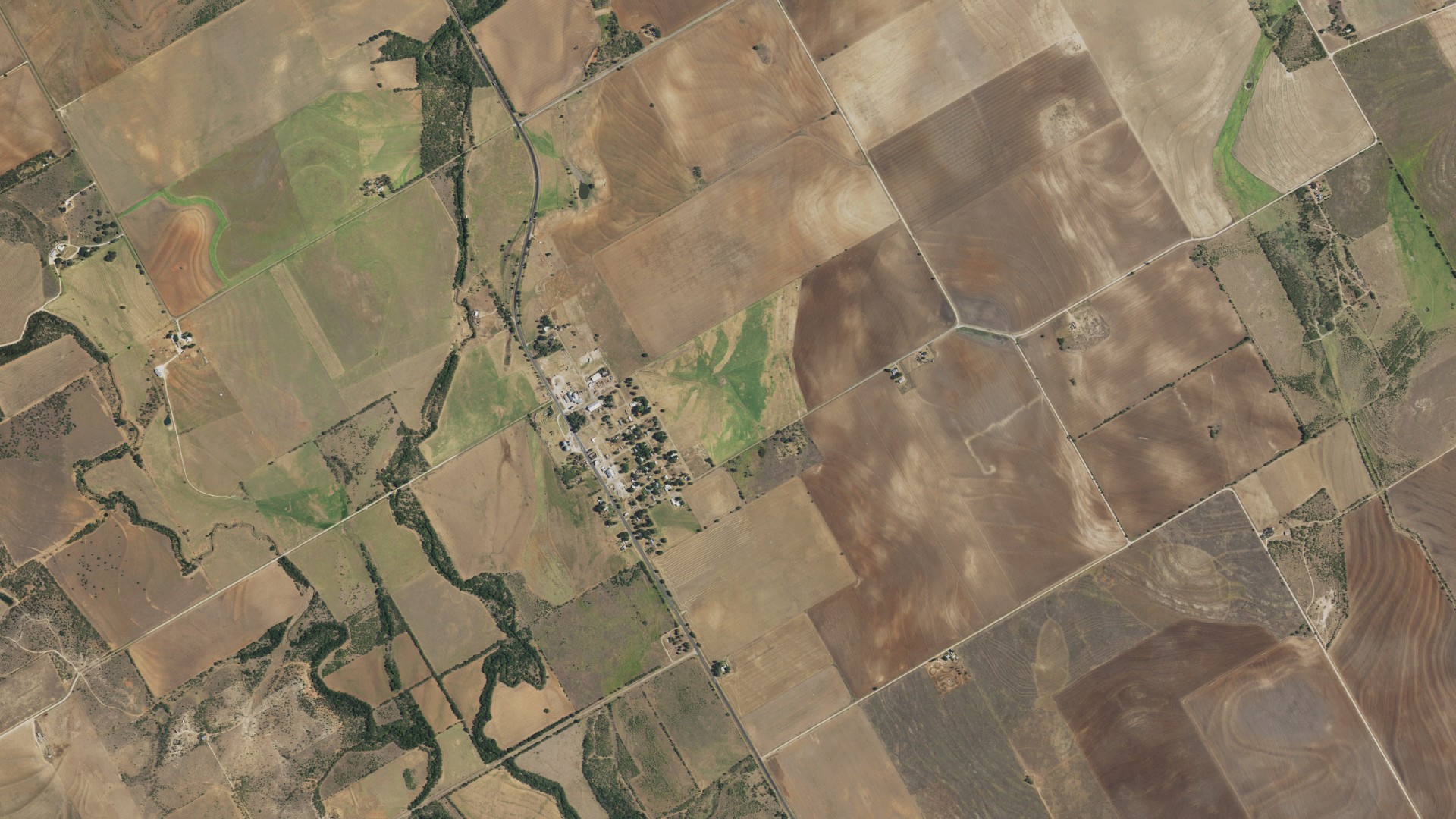 Natural-color aerial photograph of land around Wingate, Texas