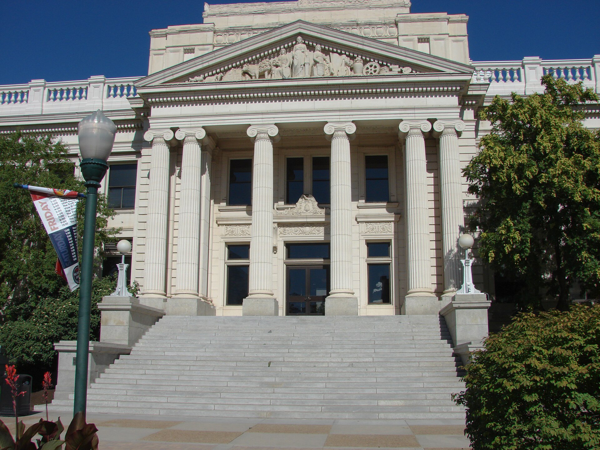 Looking east (closer) at the front entrance of the Historic Utah County Courthouse in downtown Provo, Utah, July 2015