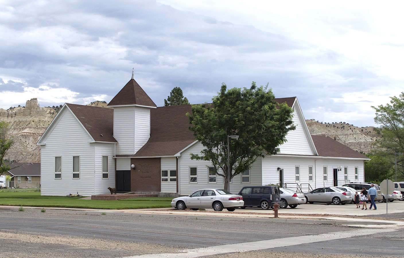A family arrives for Sunday morning services at a meetinghouse of The Church of Jesus Christ of Latter-day Saints, in Cannonville, Utah.