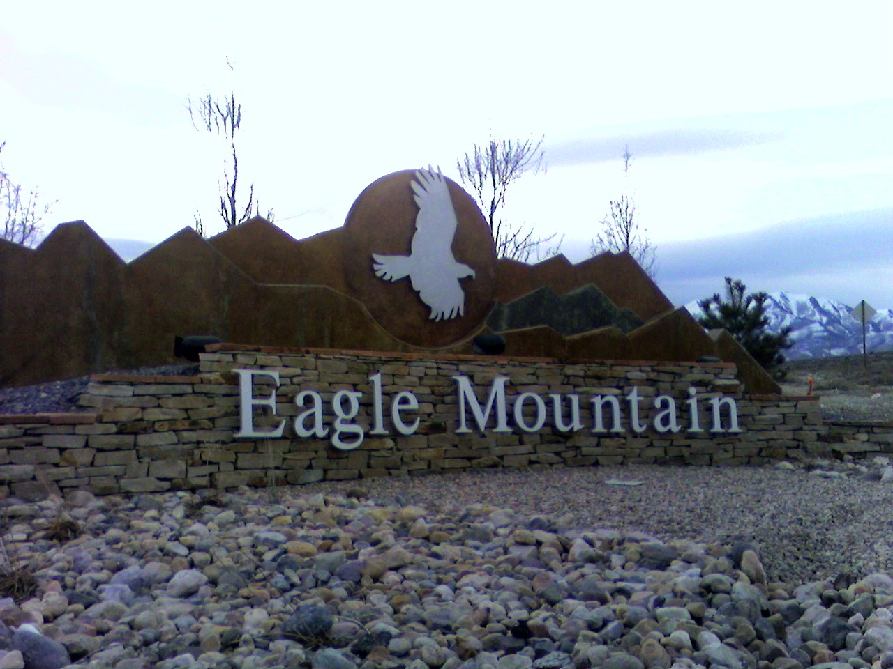 Eagle Mountain weclcome sign by David Jolley. — Utah
